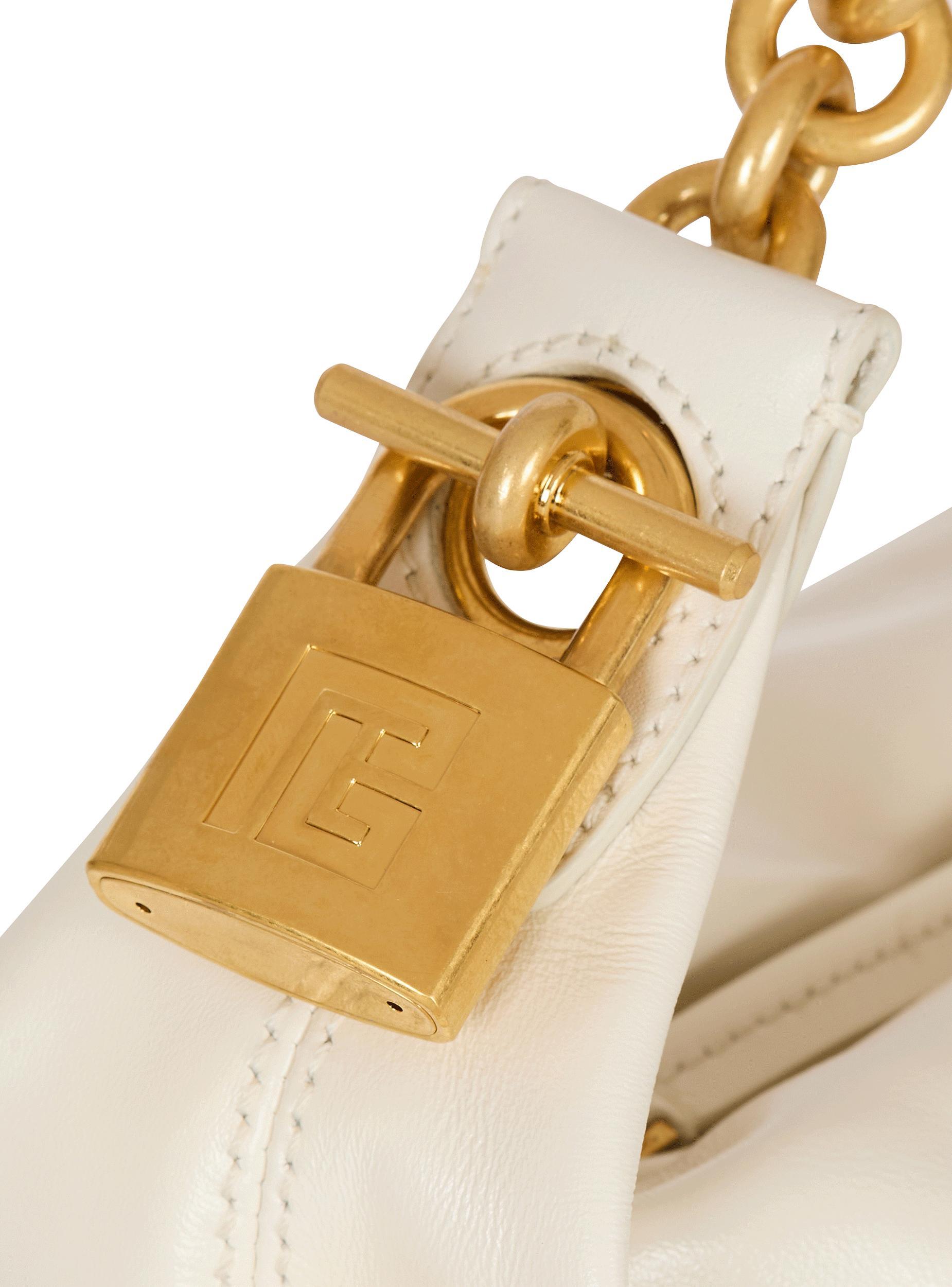 Sync Mini bag in calfskin leather Product Image