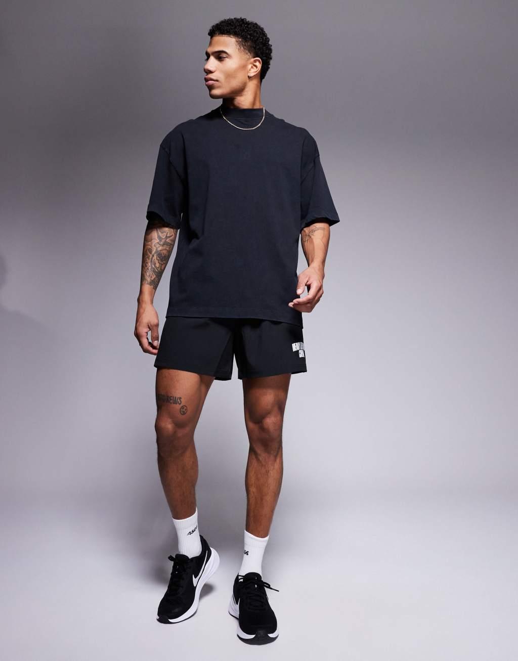 ASOS 4505 back print boxy heavyweight cotton T-shirt with quick dry finish in washed black Product Image