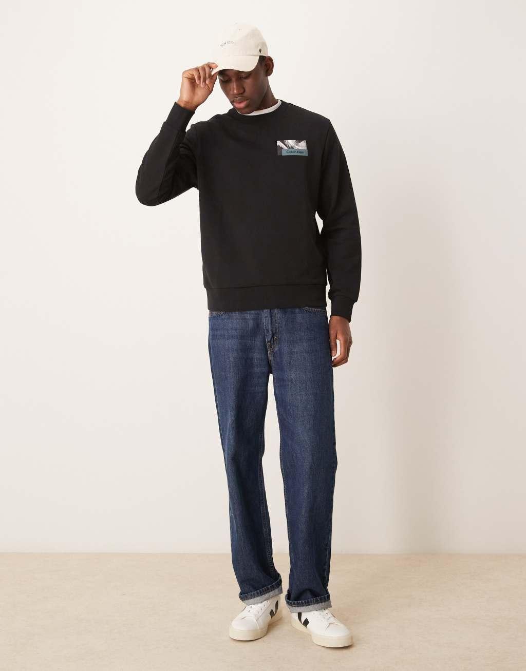 Calvin Klein back print graphic sweatshirt in black Product Image