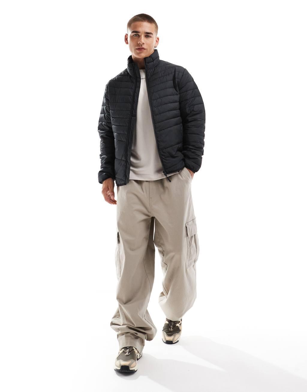 Jack & Jones packable padded jacket with standing collar in black Product Image