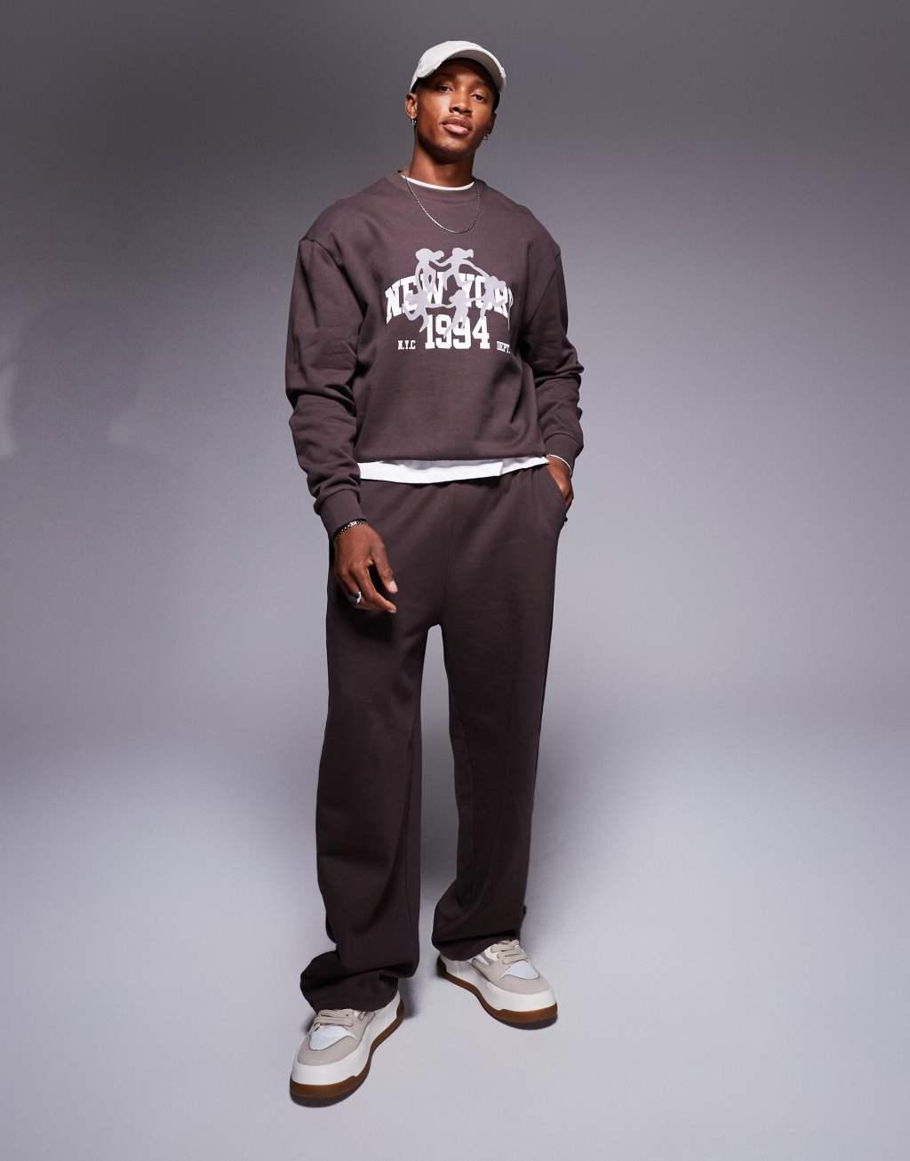 ASOS DESIGN boxy oversized sweatshirt with 1994 print in brown Product Image