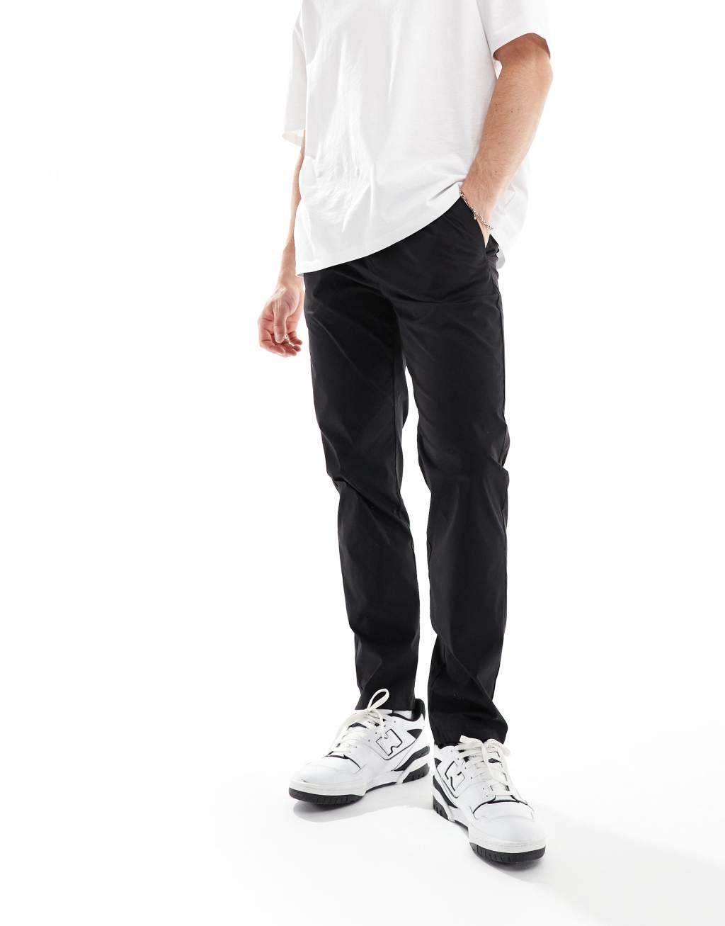 ONLY & SONS pull on tapered fit pants in black Product Image