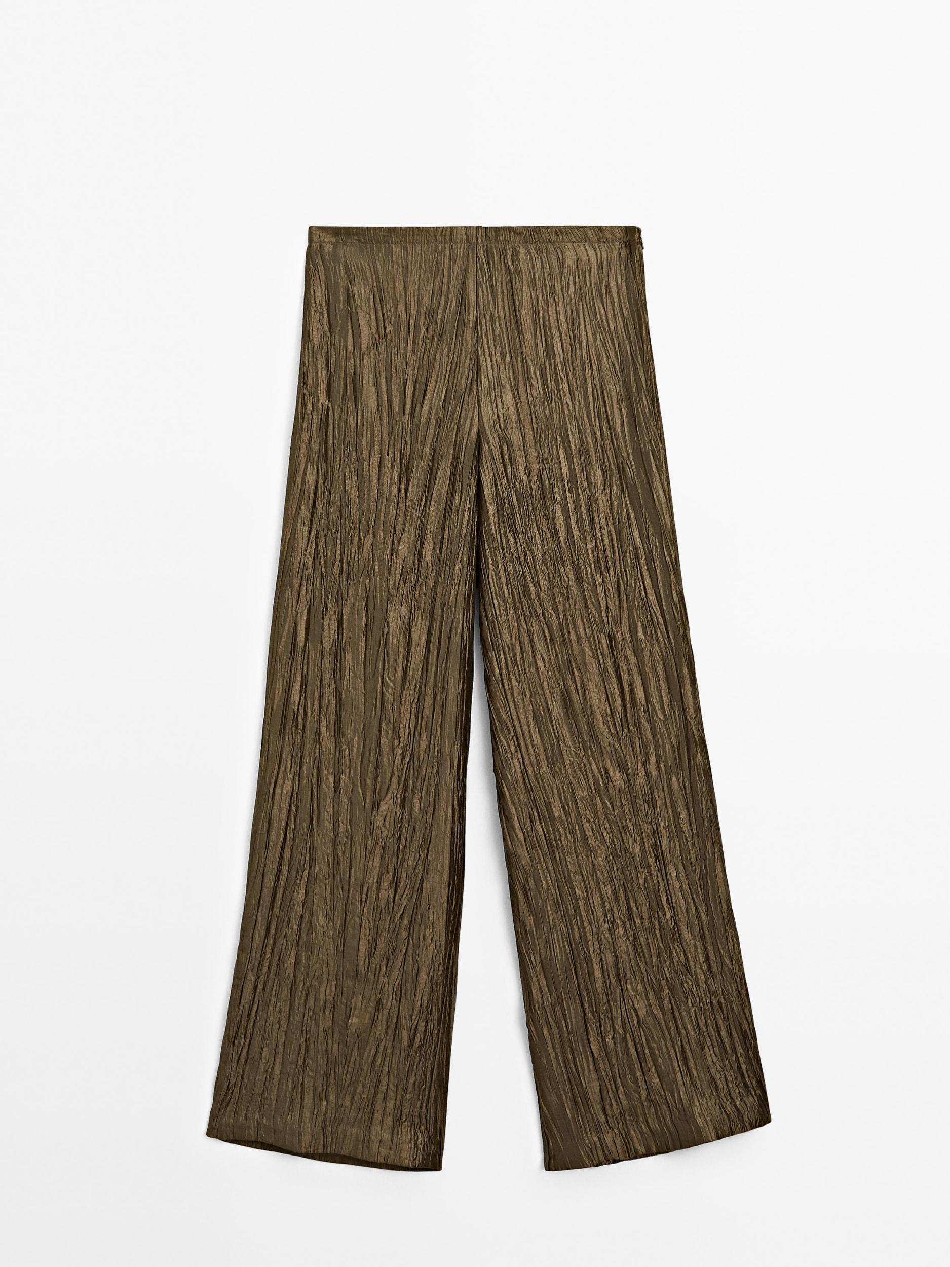 Trousers with metallic fabric detail Product Image