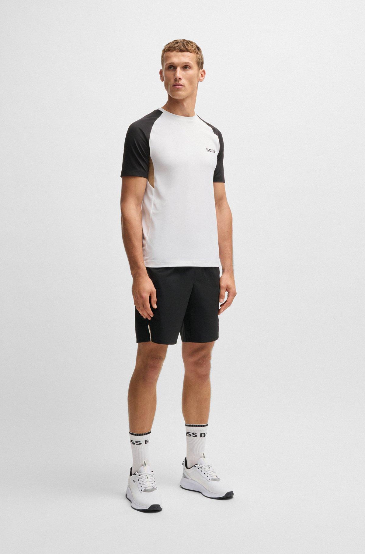 BOSS - Active color-blocked T-shirt in moisture-wicking fabric - Black Product Image