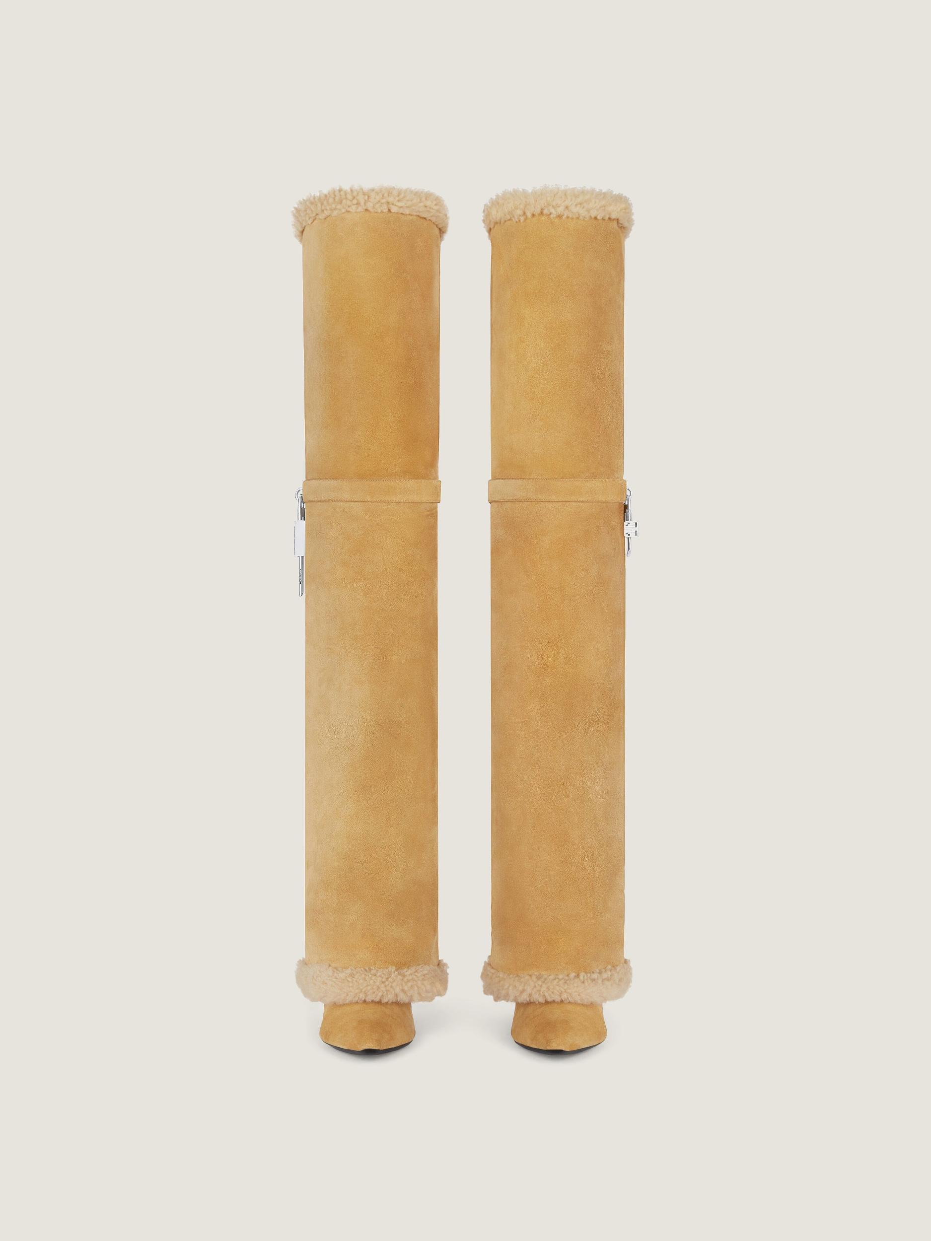 Shark Lock Stiletto boots in suede and shearling Product Image