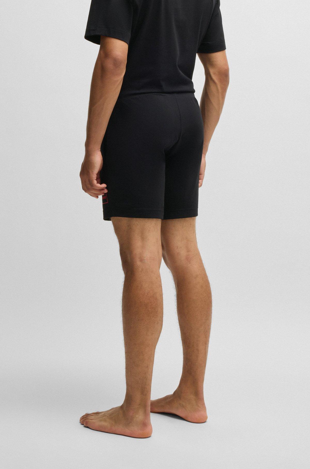 Straight-leg shorts in stretch cotton with logo print Product Image