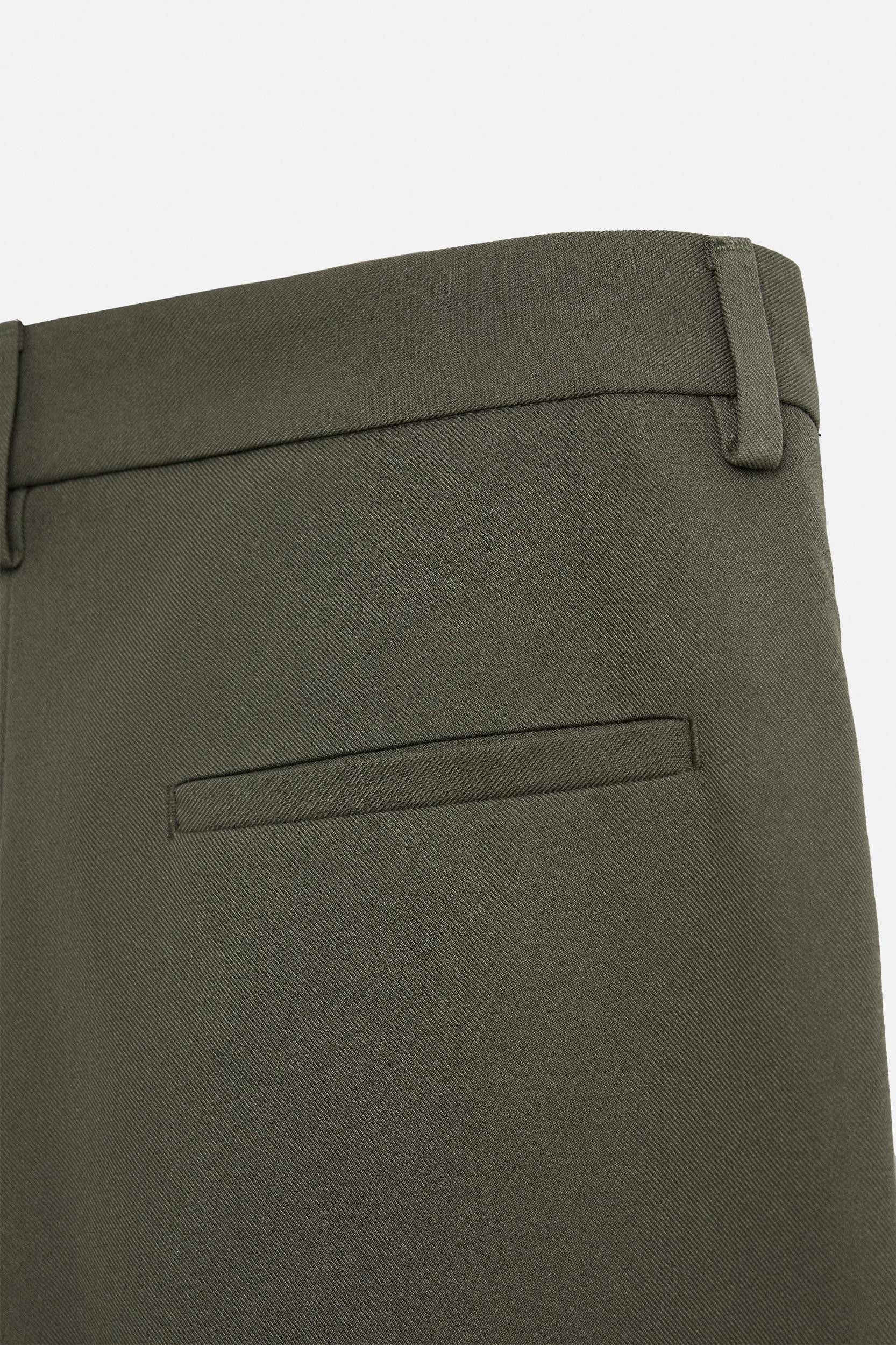 RELAXED FIT PLEATED PANTS Product Image