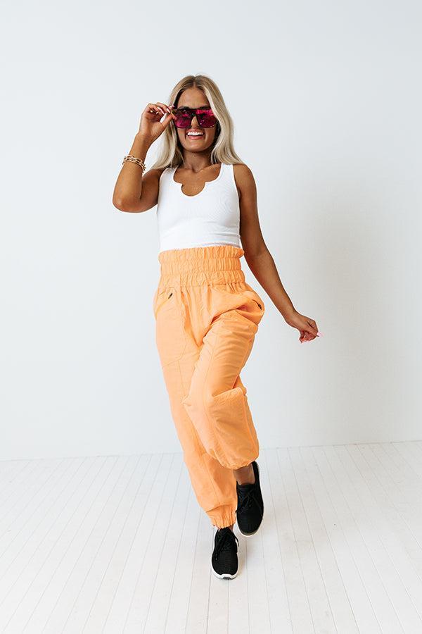 The Huxley High Waist Windbreaker Pants In Neon Orange Product Image