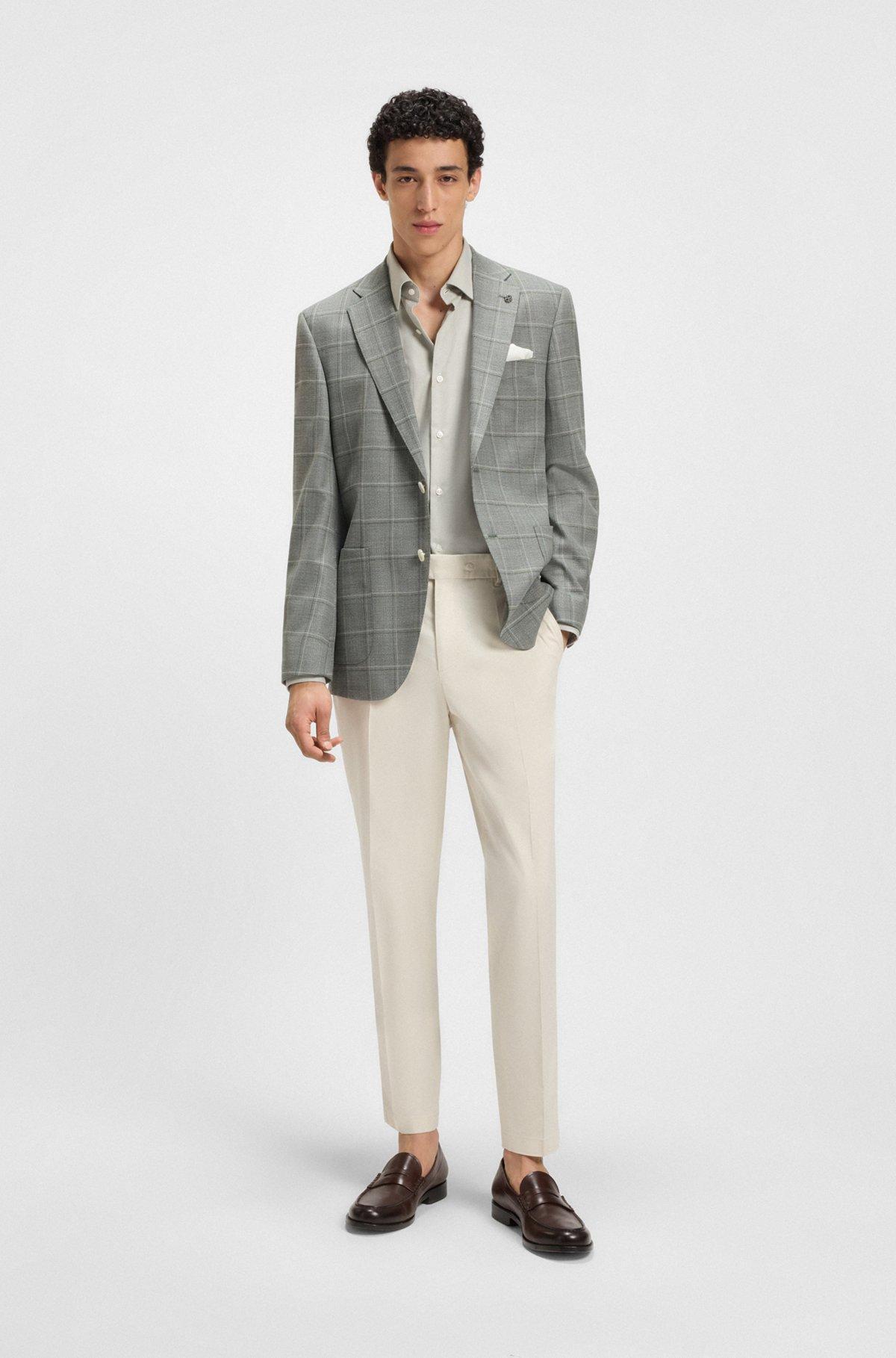 Machine-washable tapered-fit trousers in stretch fabric Product Image