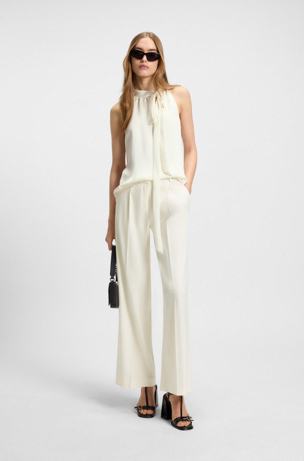 Sleeveless top in satin with tie neck Product Image