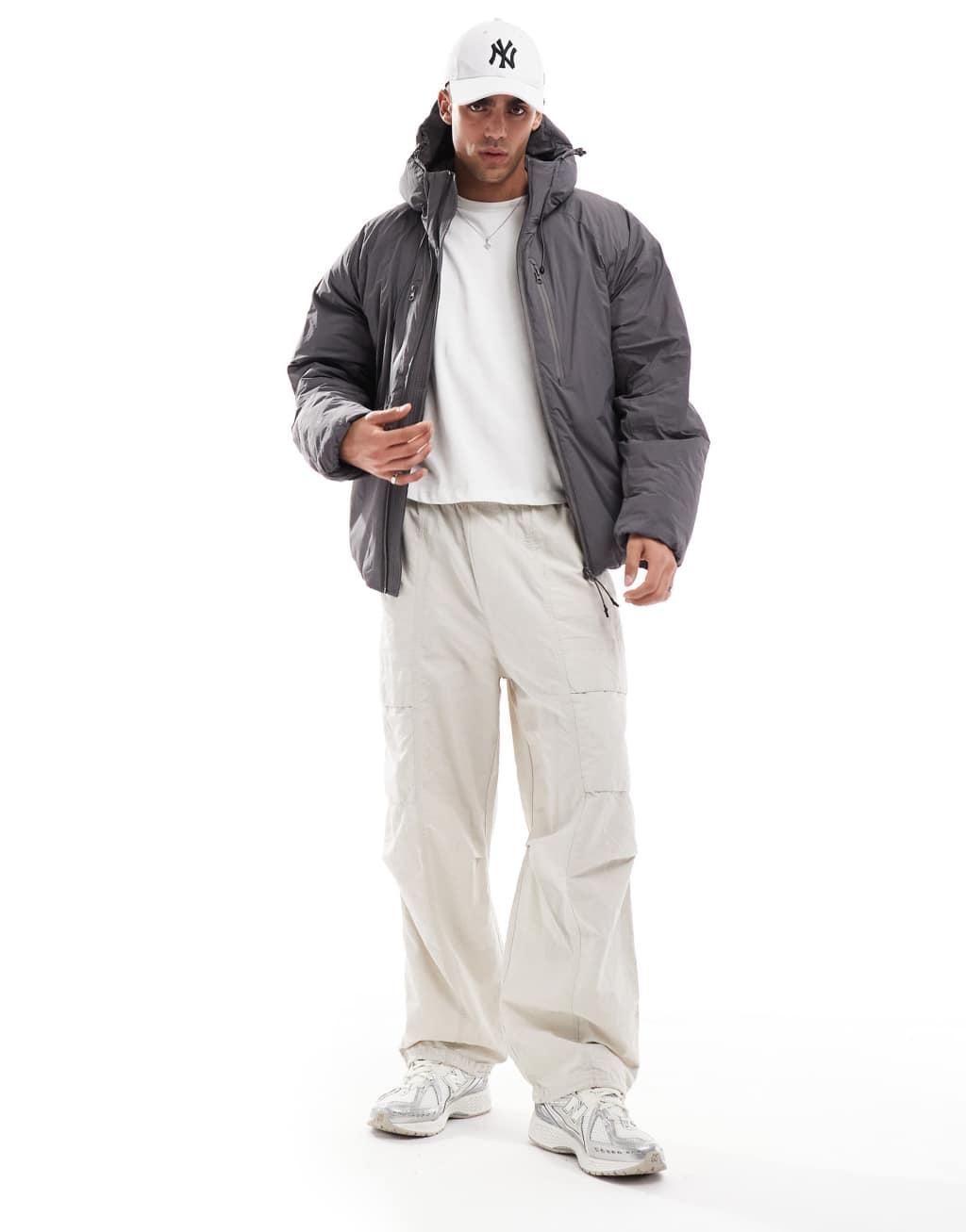 Jack & Jones hooded puffer jacket with tech details in dark gray Product Image