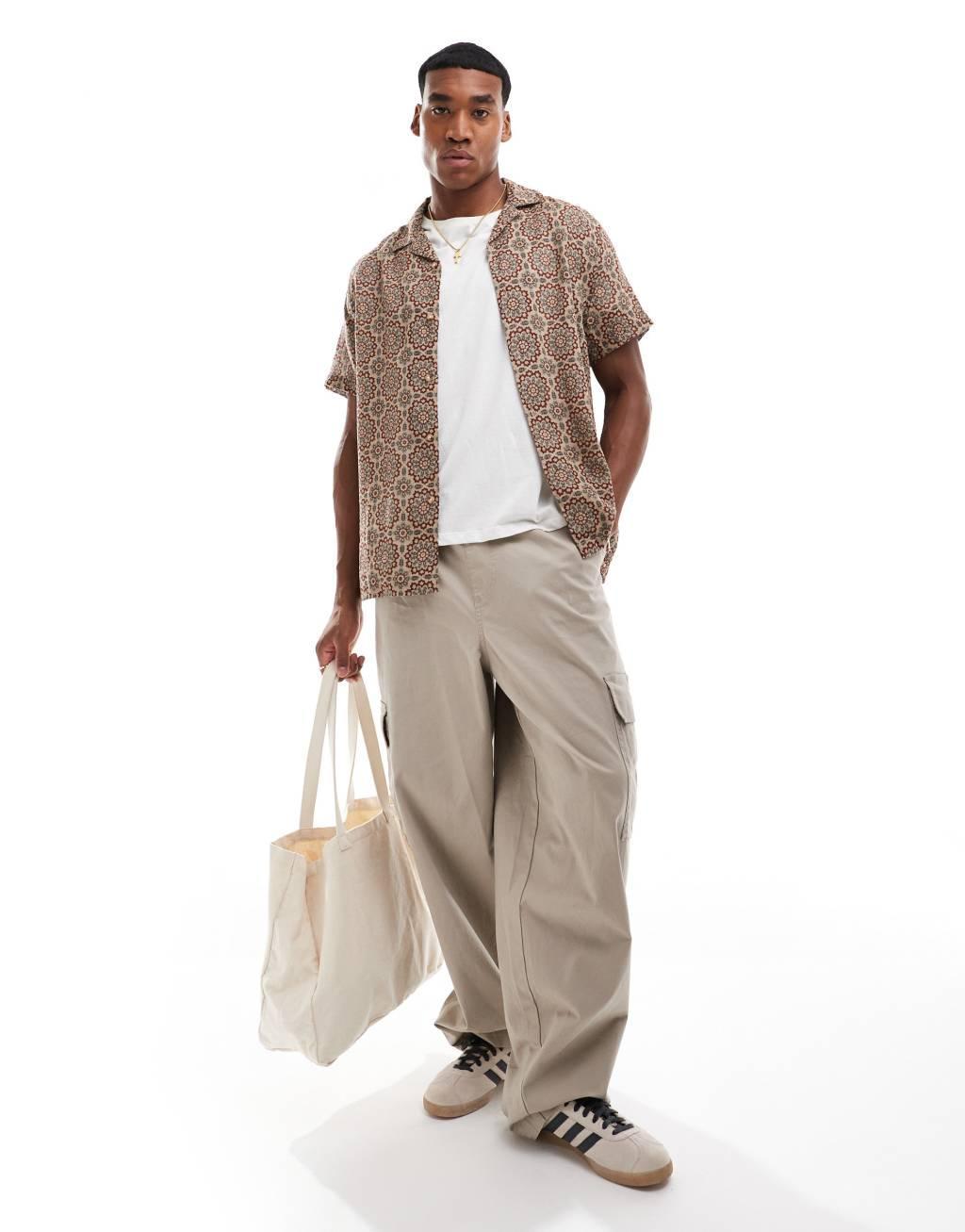 ASOS DESIGN relaxed camp collar textured shirt in geo print  Product Image