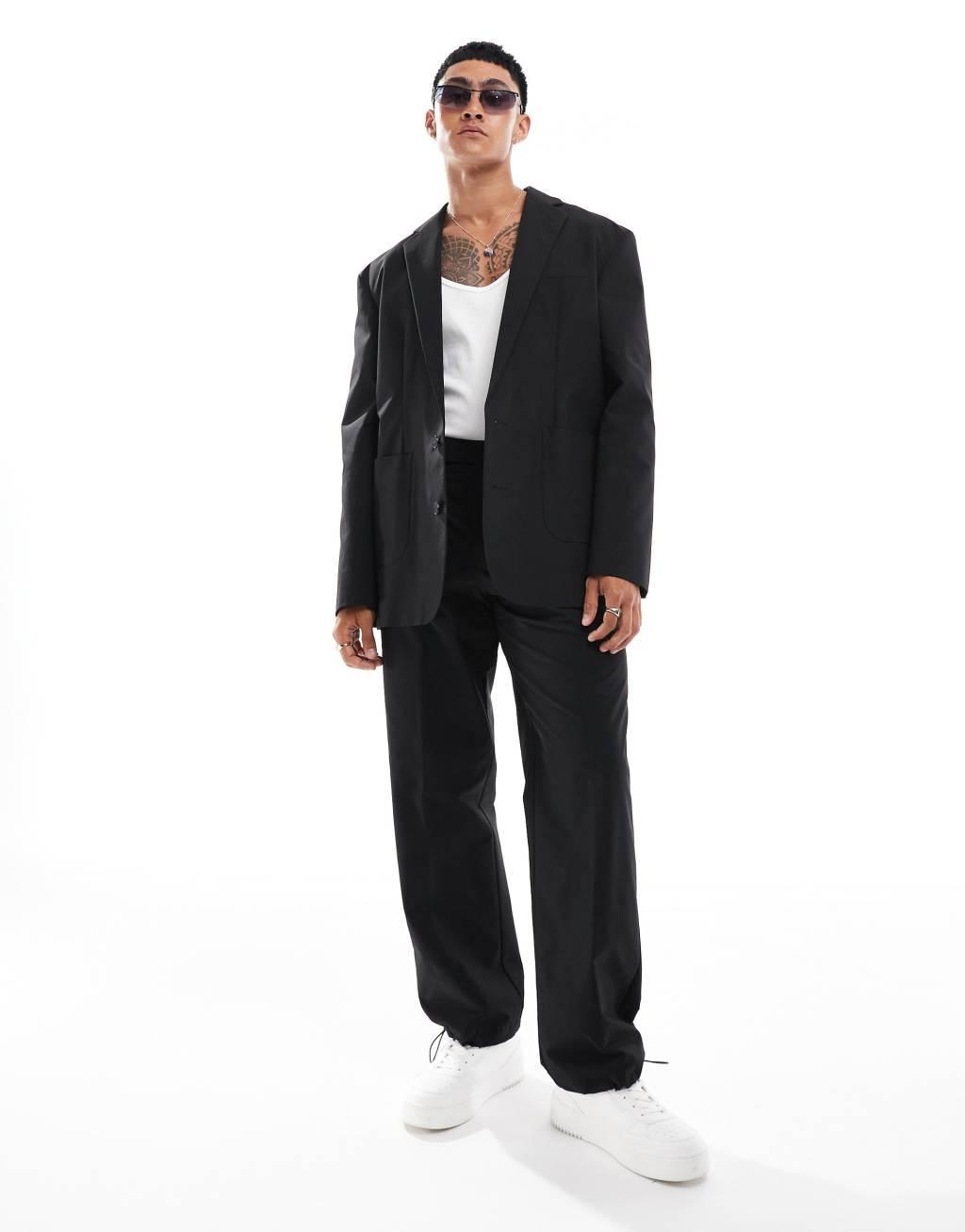ASOS DESIGN relaxed tech suit jacket in black Product Image