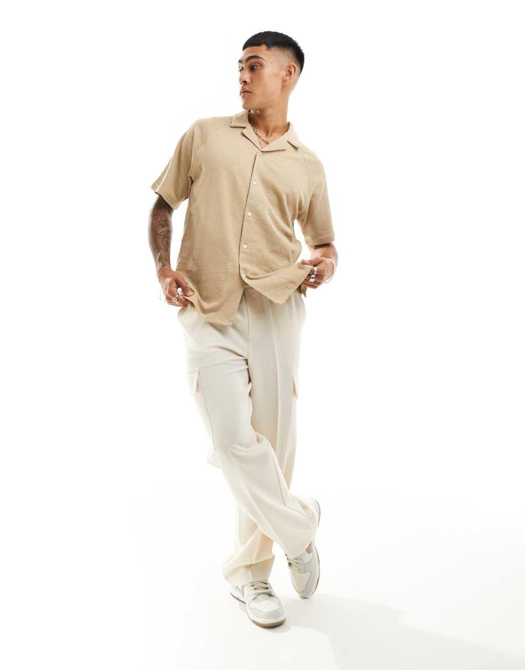 Jack & Jones oversized textured revere collar shirt in beige Product Image