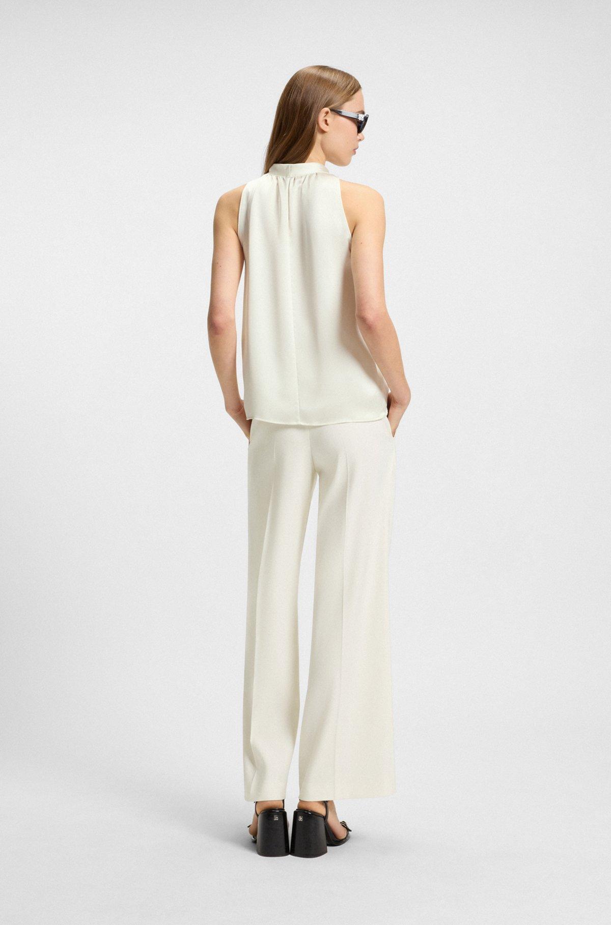 Sleeveless top in satin with tie neck Product Image