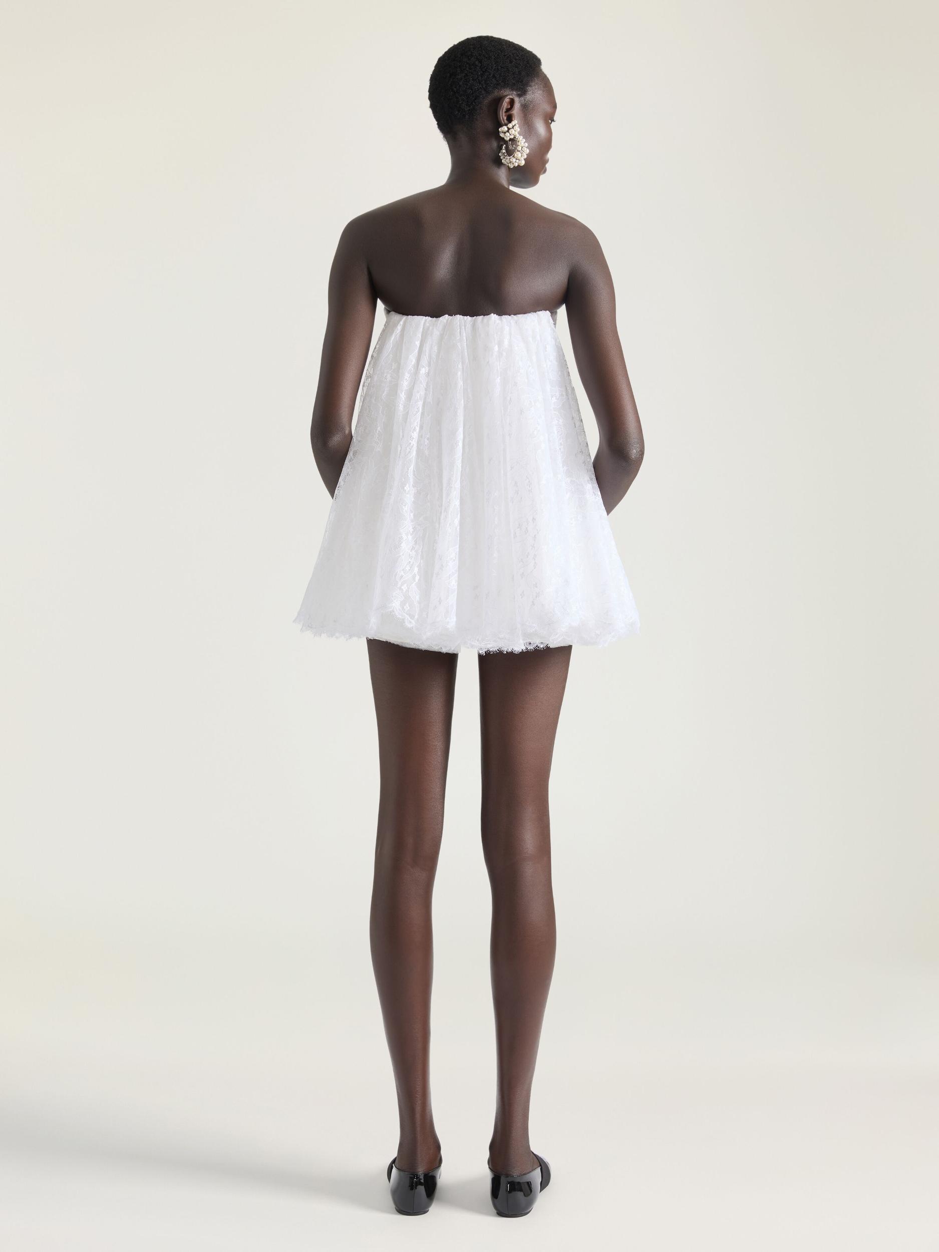 Mini bustier dress in lace with cape Product Image