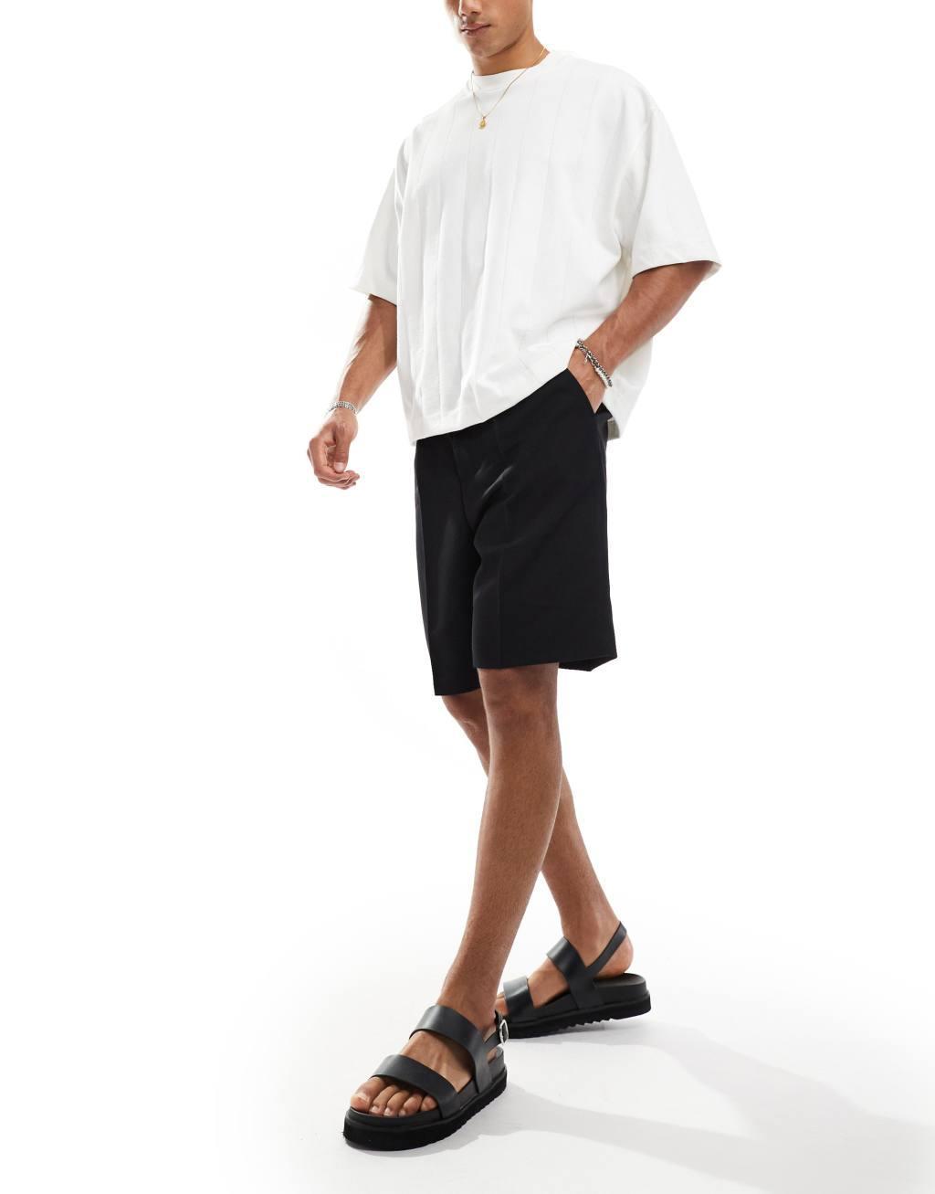 ASOS DESIGN dressy wide leg shorts in black Product Image