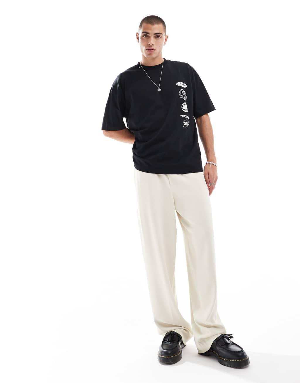 ASOS DESIGN boxy oversized t-shirt with celestial chest and spine print in black Product Image