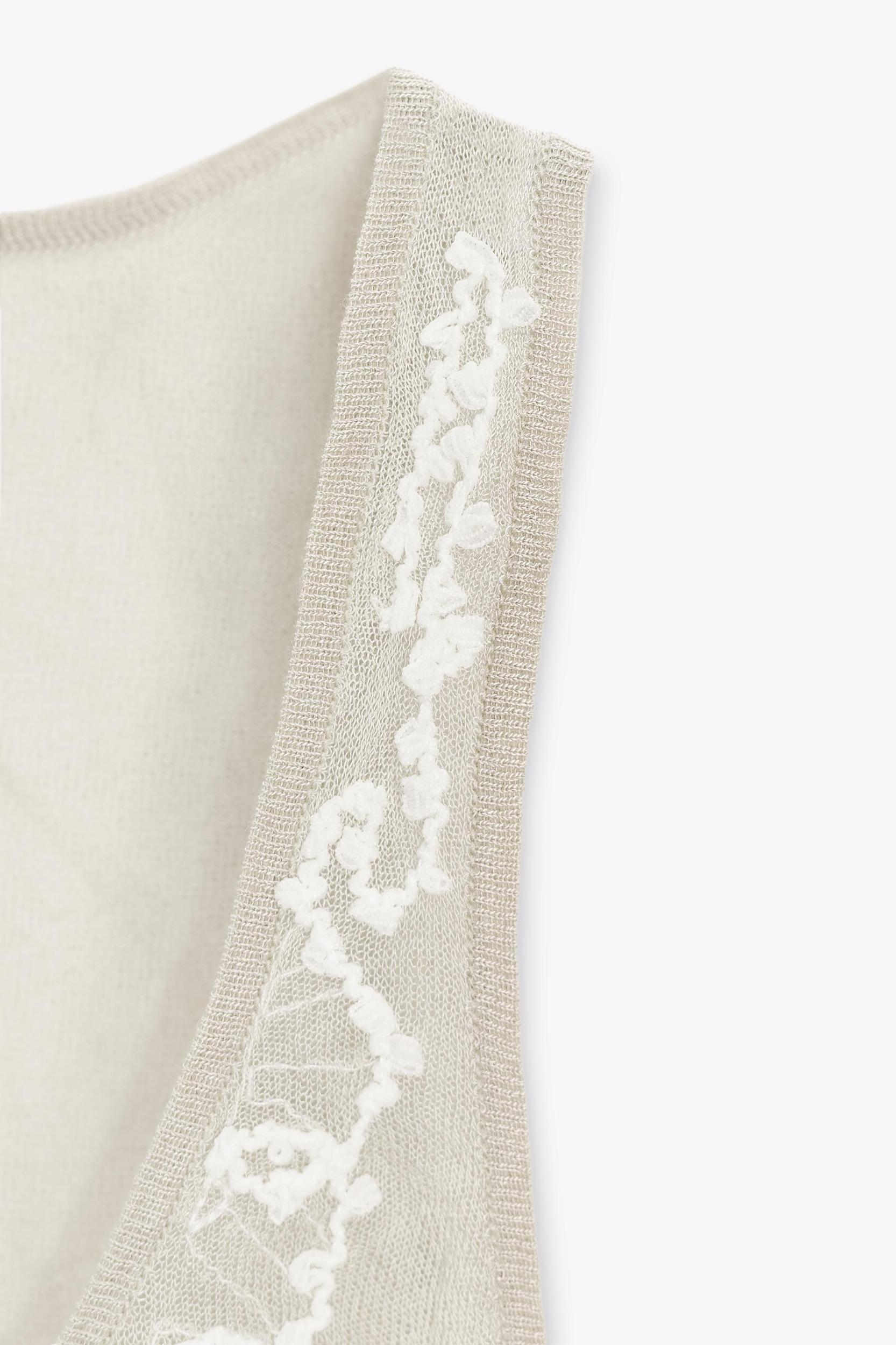 SEMI-SHEER STRUCTURED KNIT TOP Product Image