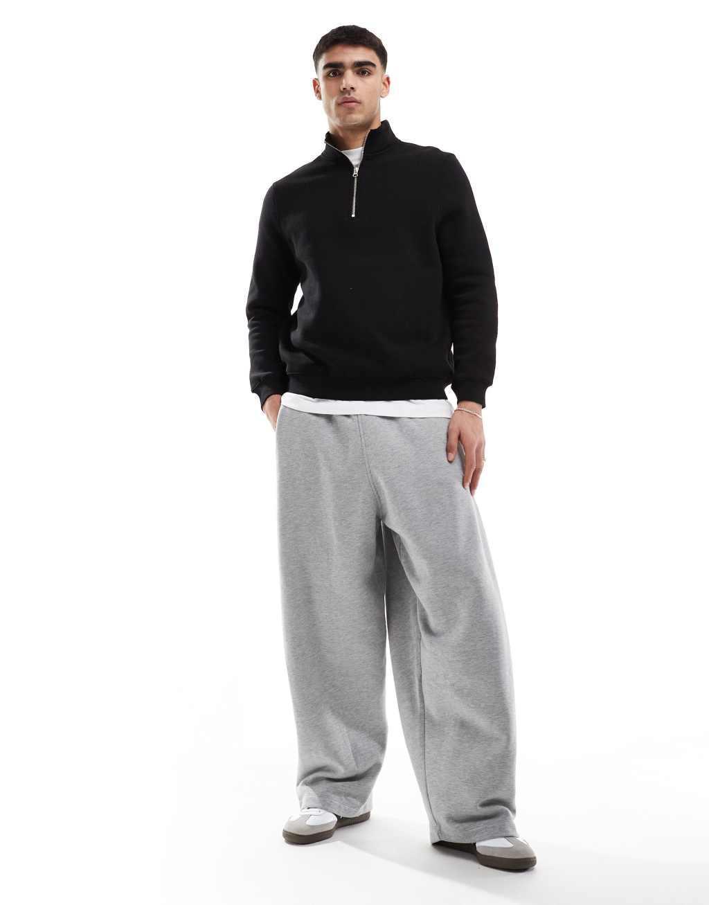 ASOS DESIGN quarter zip sweatshirt in black Product Image