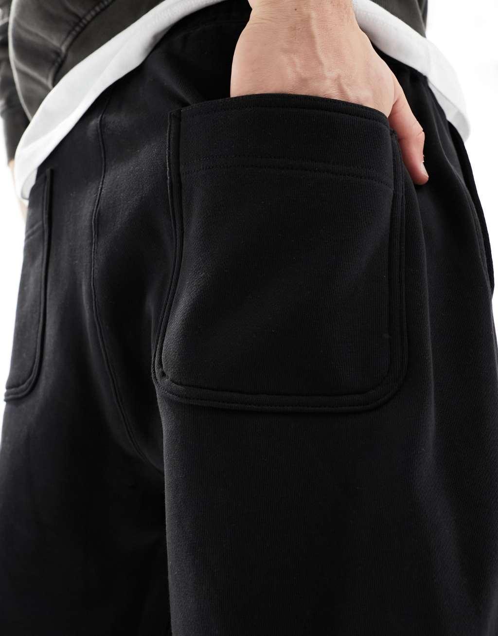 Weekday Astro loose fit sweatpants in black Product Image