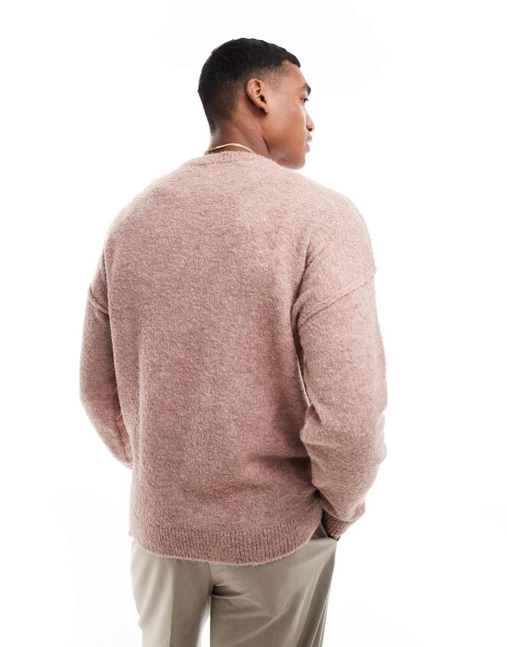ASOS DESIGN relaxed lightweight boucle texture knitted crew neck sweater in pink Product Image