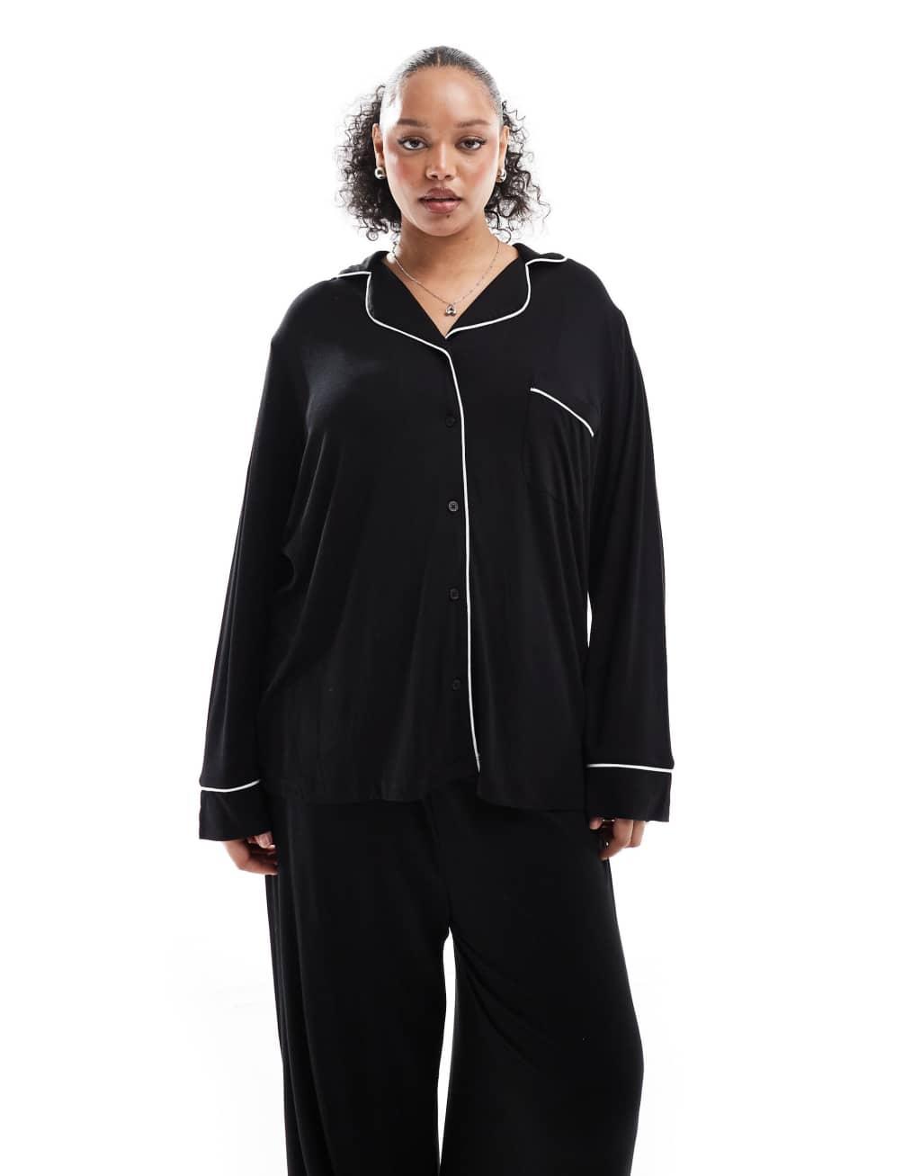 ASOS DESIGN Curve super soft long sleeve shirt & pants pajama set with contrast piping in black Product Image