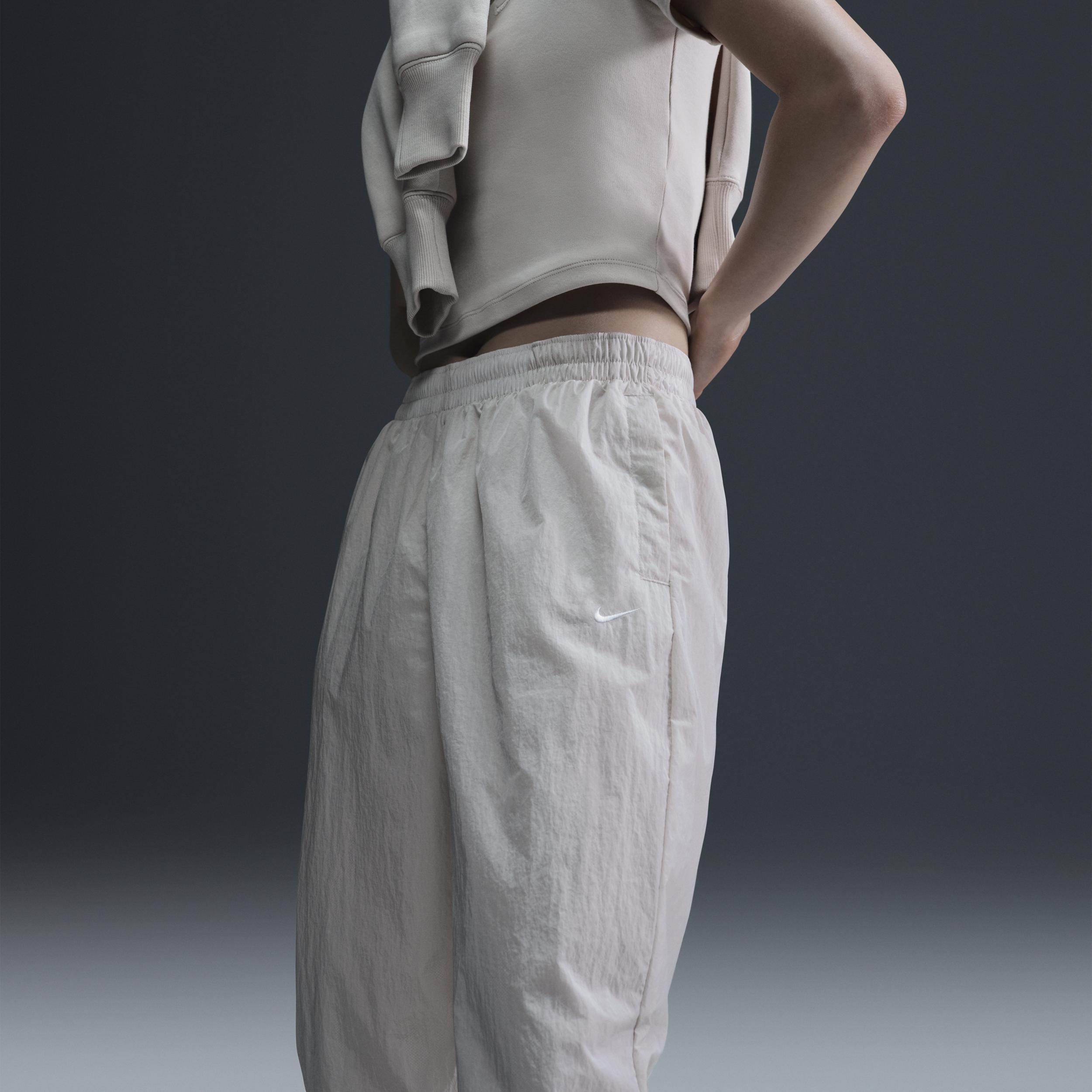 Women's Nike Sportswear Essential Mid-Rise Oversized Woven Jogger Pants Product Image