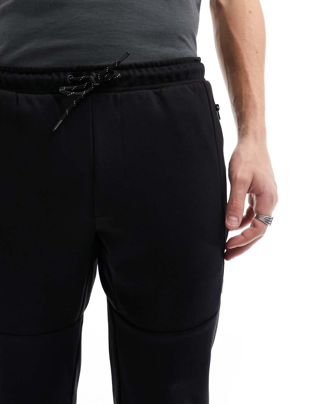 Jack & Jones tech sweatpants in black  Product Image
