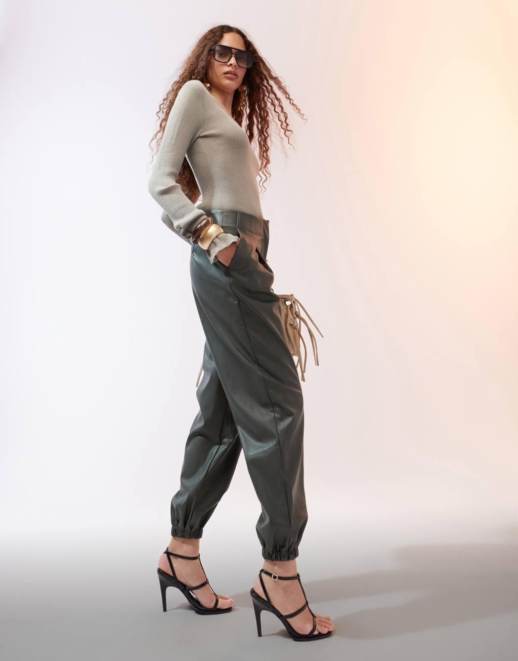 ASOS DESIGN faux leather sweatpants in khaki Product Image