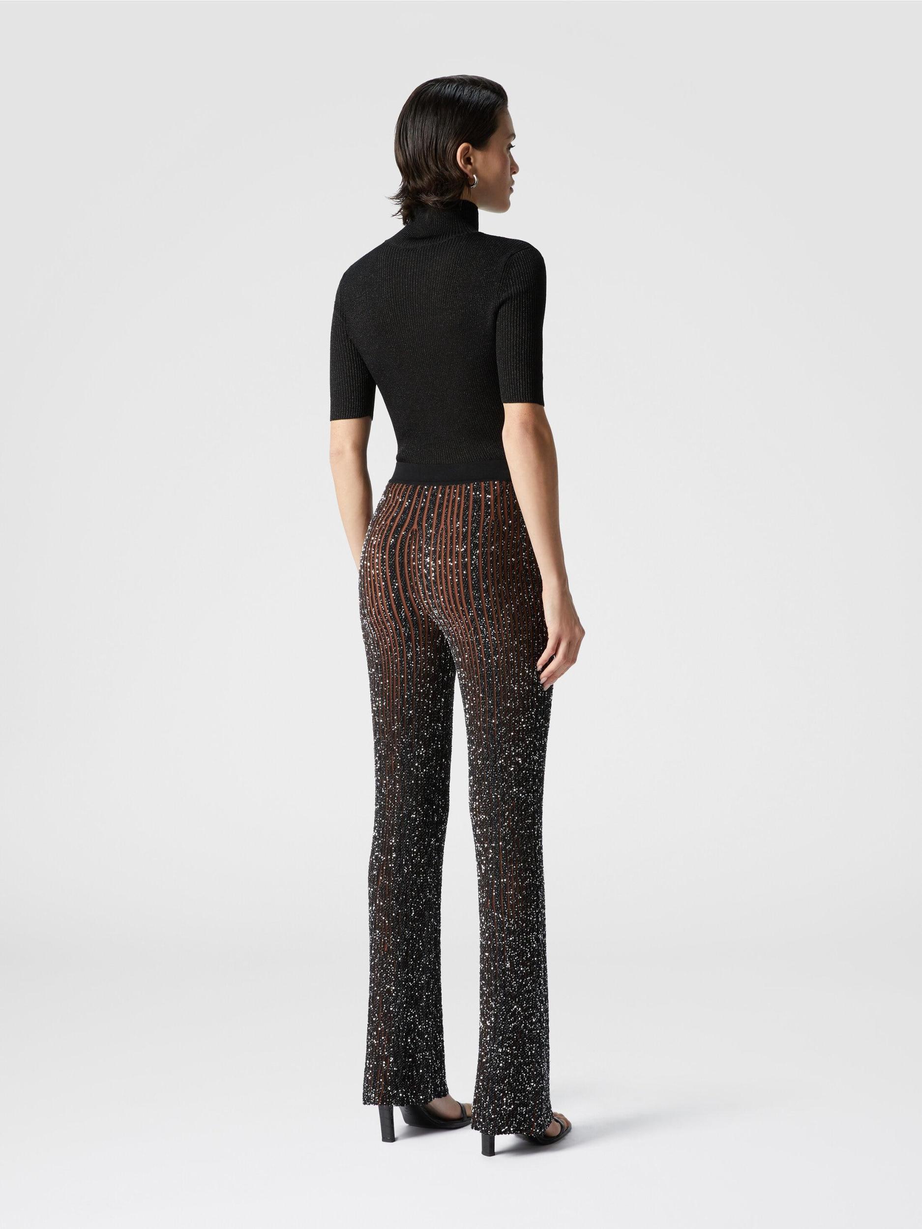Ribbed stretch flared trousers with sequins Product Image