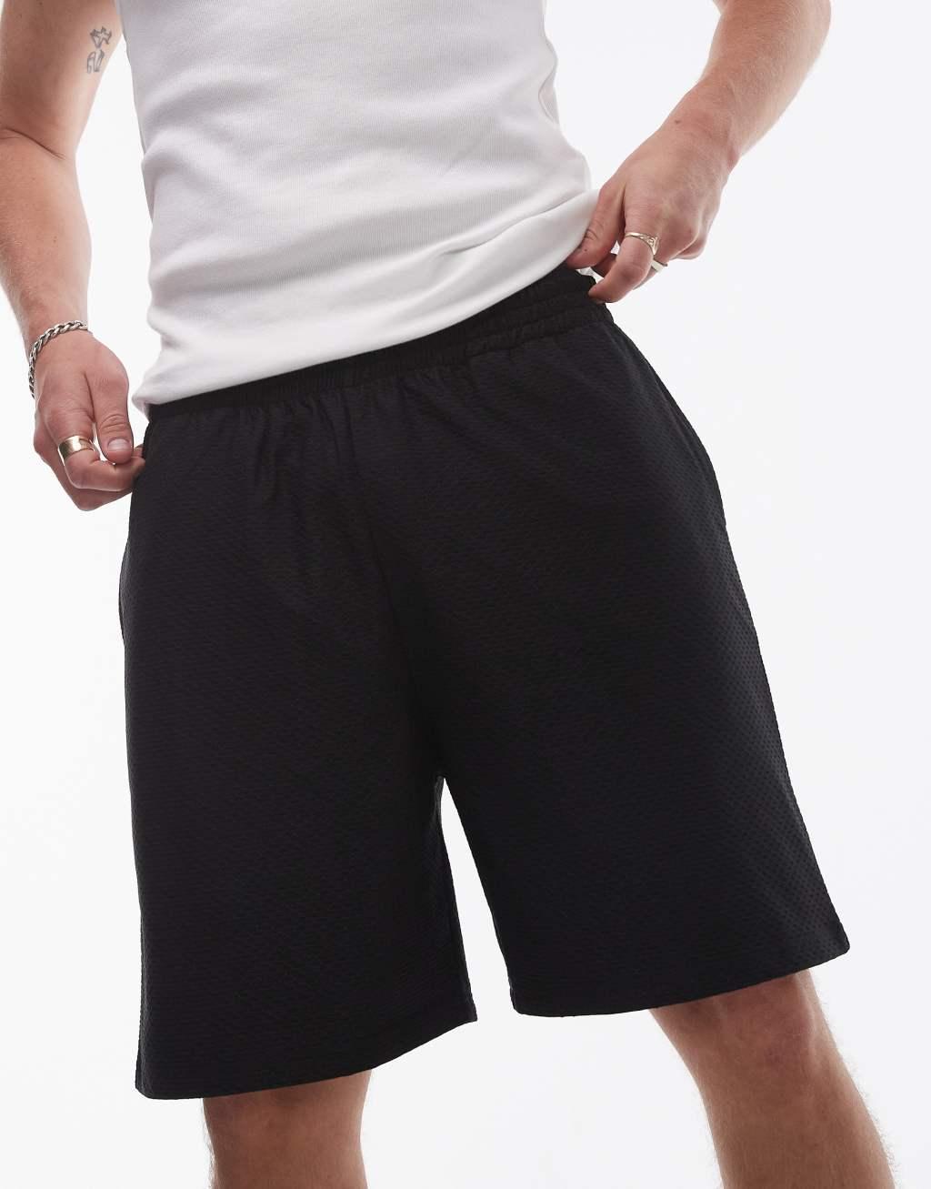 Topman oversized fit airtex shorts in black Product Image