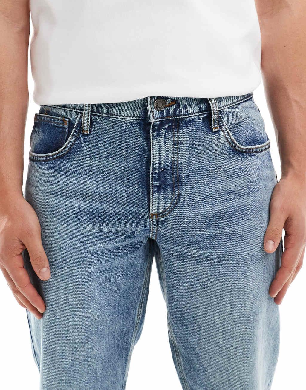 ASOS DESIGN tapered fit jeans in mid wash blue  Product Image