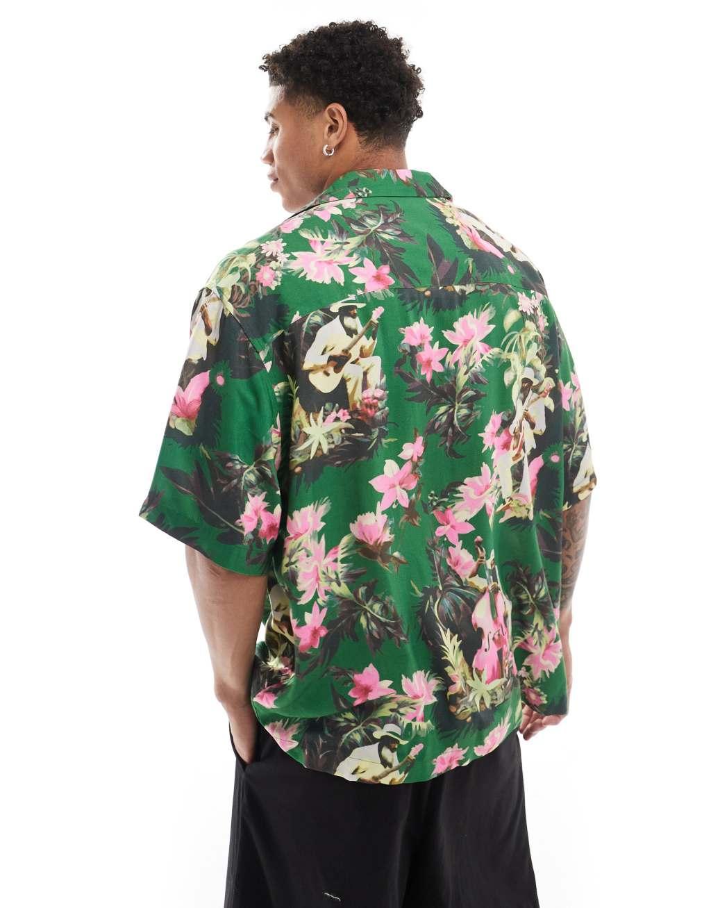 ASOS DESIGN oversized camp collar shirt with cello player hawaiian print Product Image