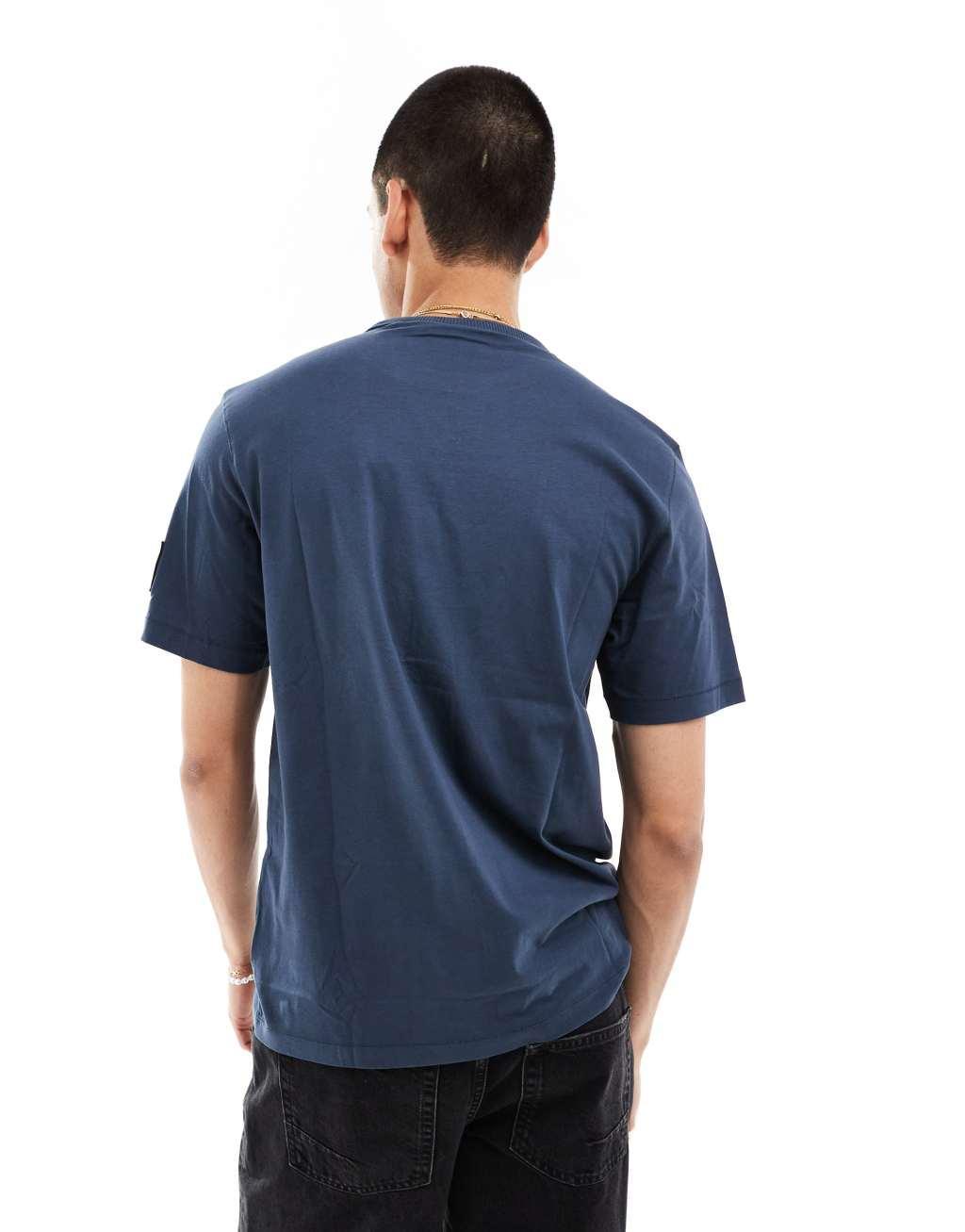 Calvin Klein Jeans badge T-shirt in navy Product Image