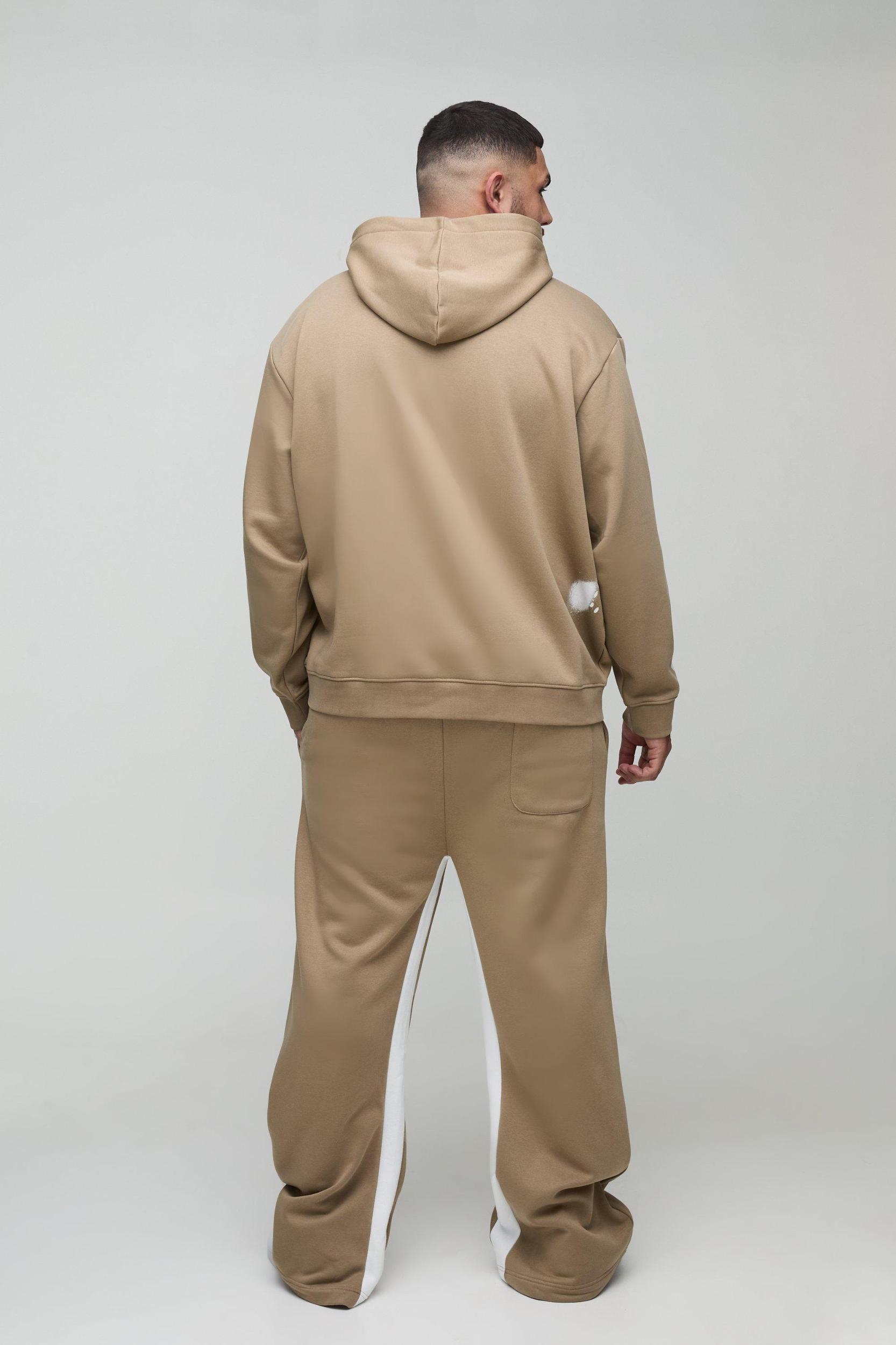 Plus Oversized Man Paint Splatter Hooded Relaxed Flare Tracksuit | boohooMAN USA Product Image
