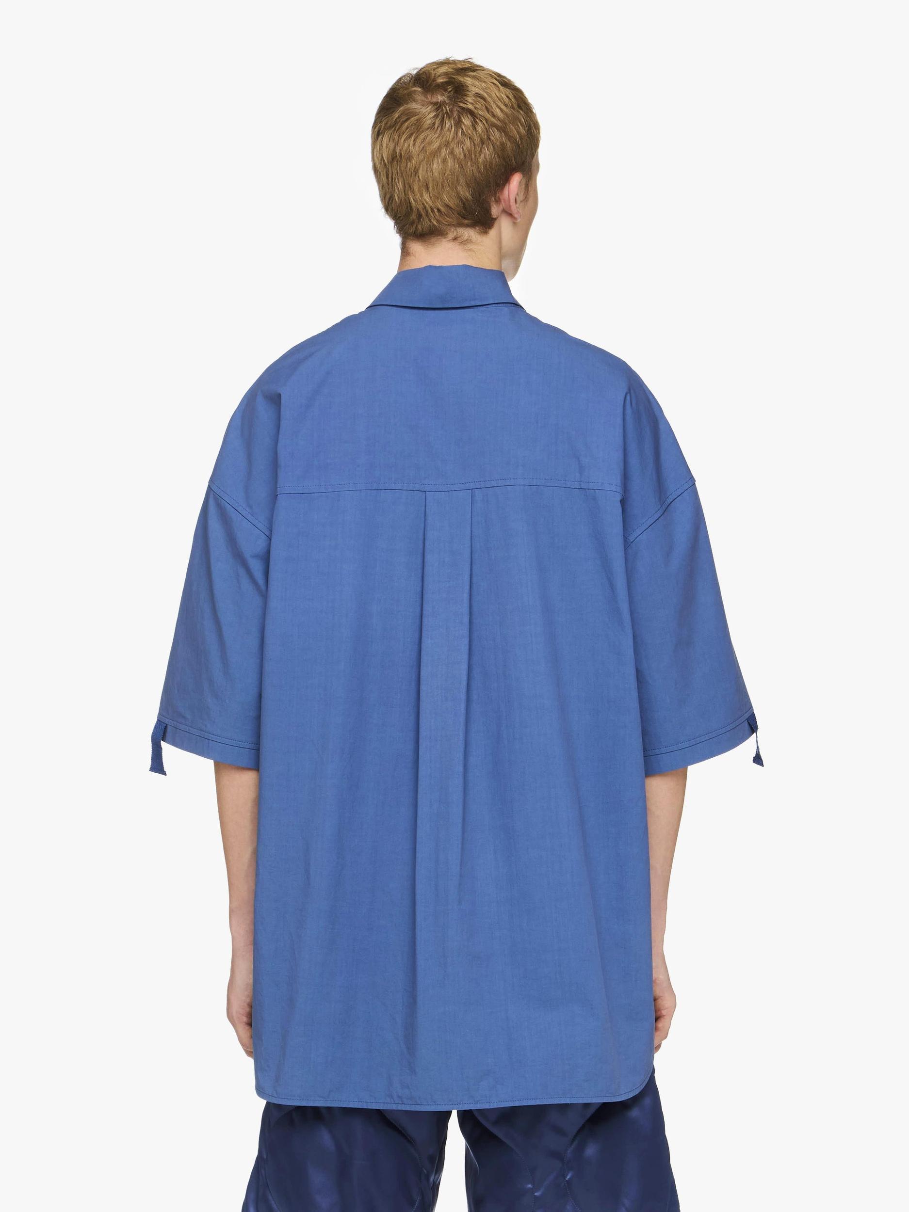 QUILTED POCKET POLO TOP Product Image