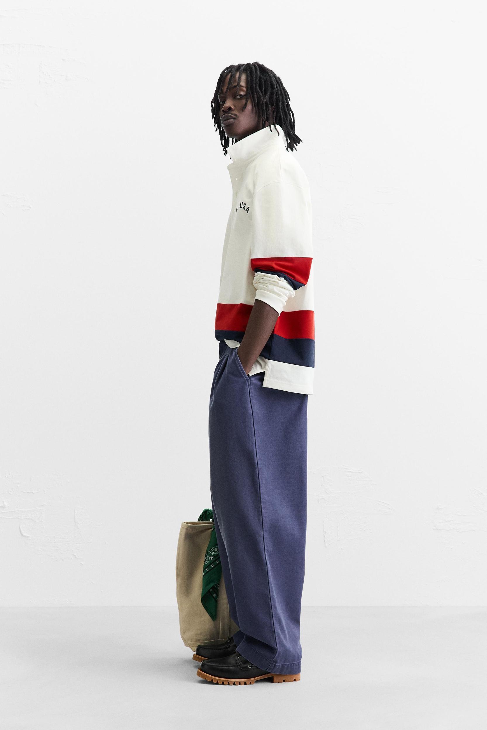 POLO WITH CONTRASTING SIDE STRIPE Product Image