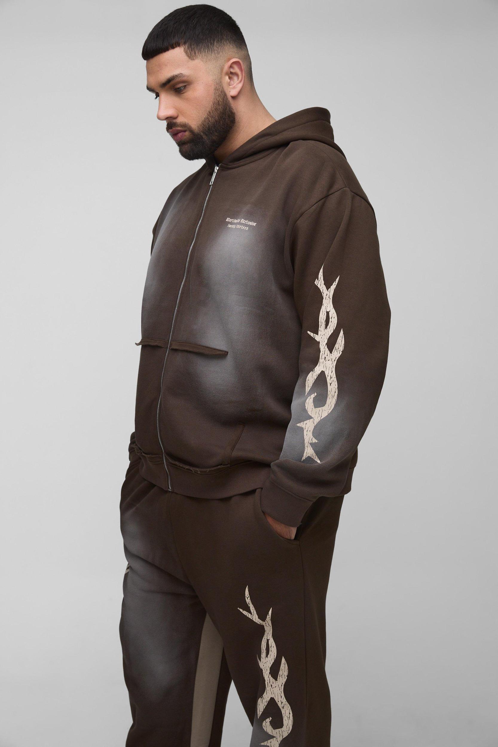 Plus Oversized Zip Thru Graphic Spray Wash Hooded Relaxed Flare Tracksuit | boohooMAN USA Product Image