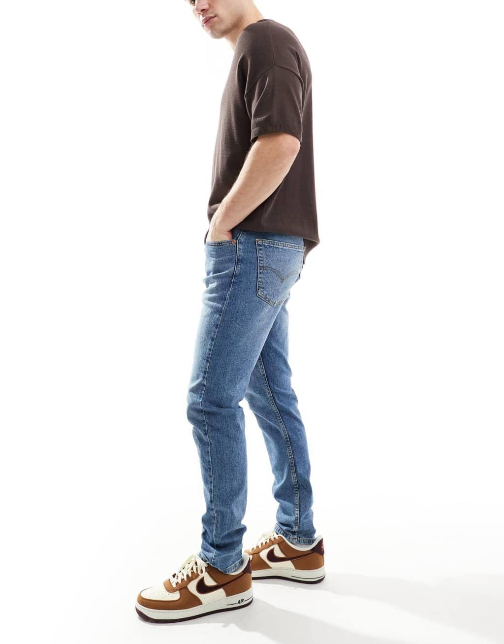 Levi's 515 slim fit jeans in mid blue Product Image