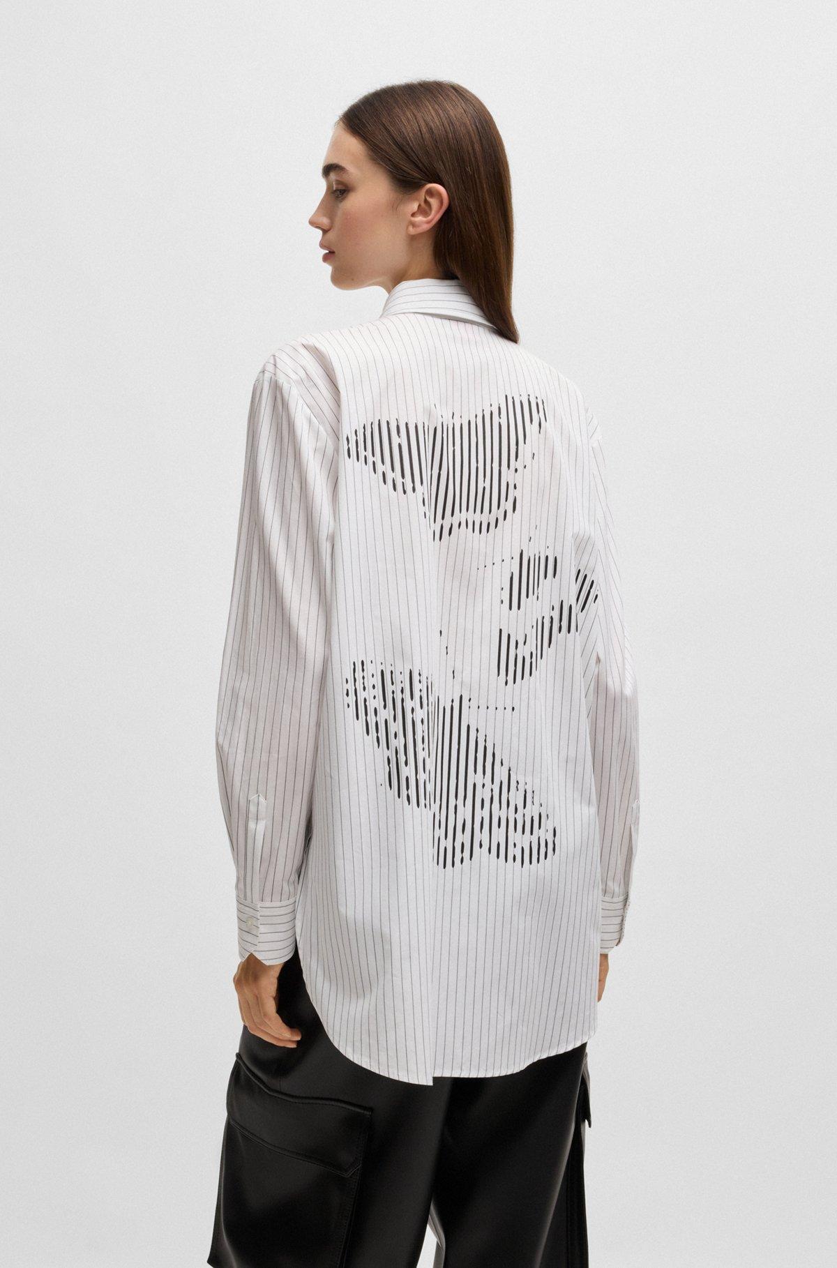 HUGO - Oversize-fit blouse in striped cotton with butterfly print - Patterned Product Image