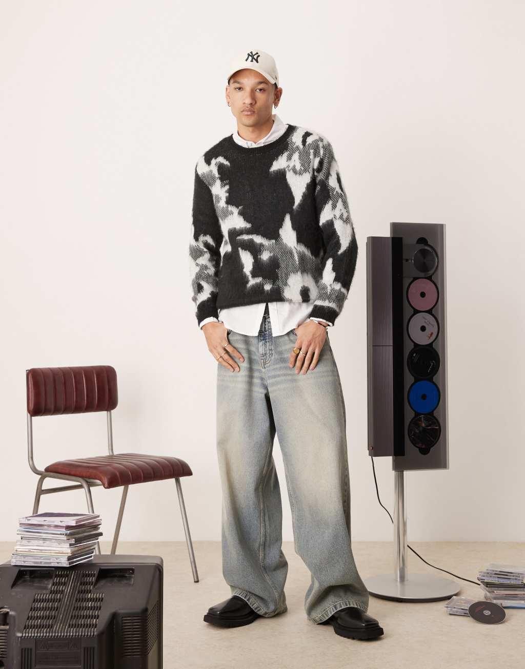 ASOS DESIGN relaxed knit crew neck sweater in black with floral pattern Product Image