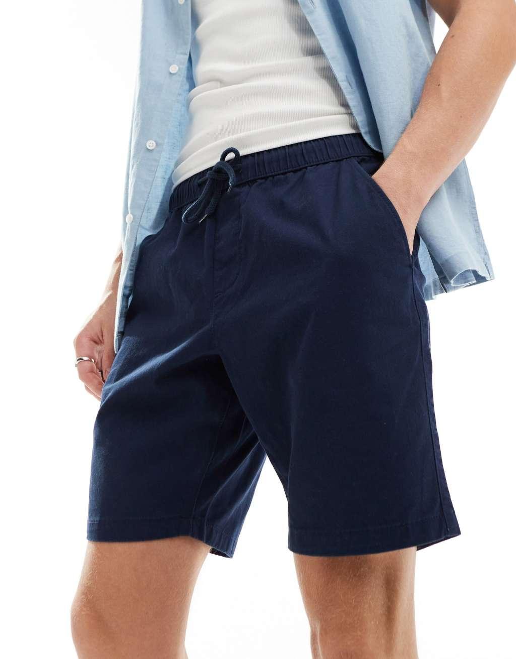 ASOS DESIGN slim chino shorts in navy Product Image