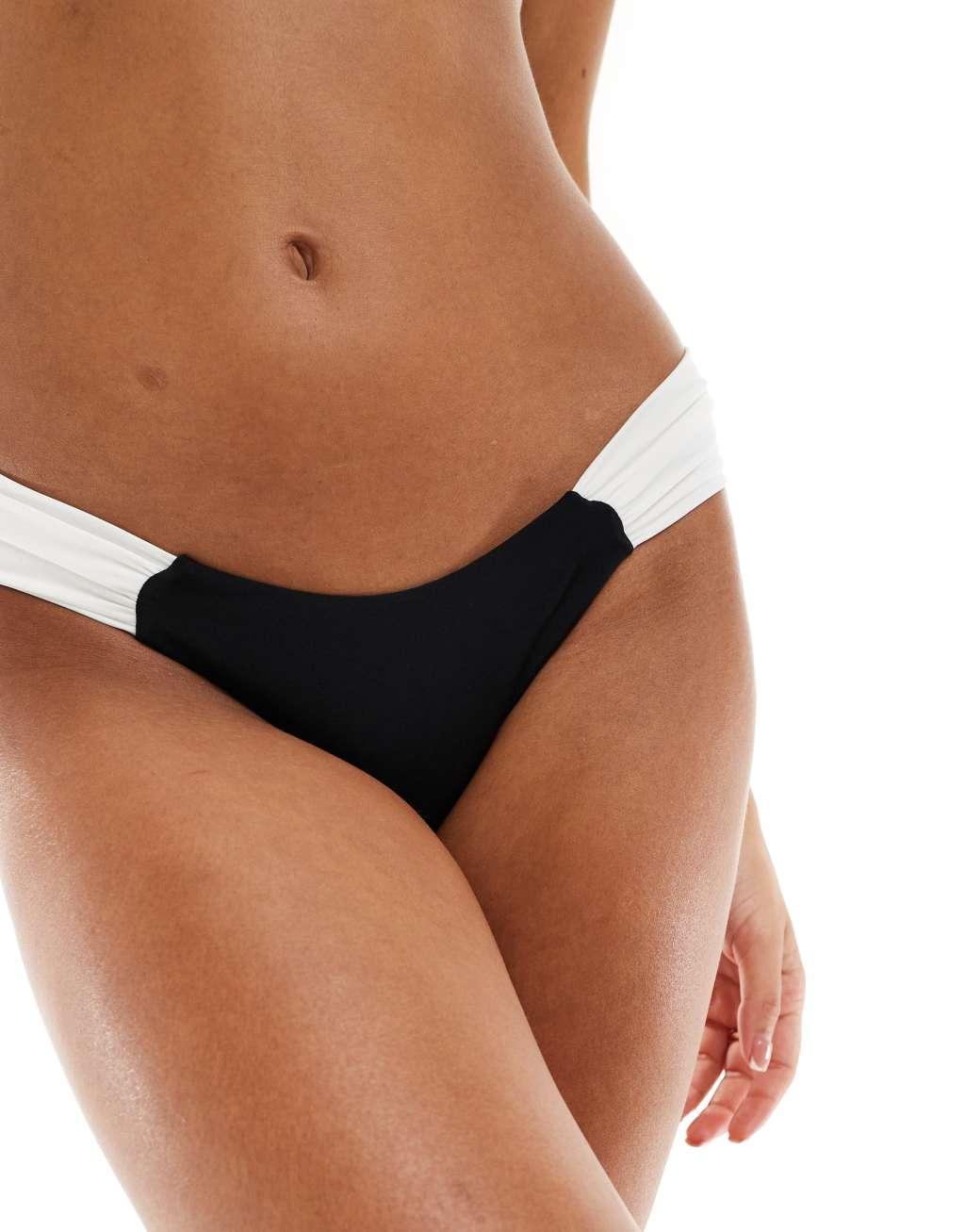 Free Society ruched side contrast bikini bottoms in black and cream Product Image