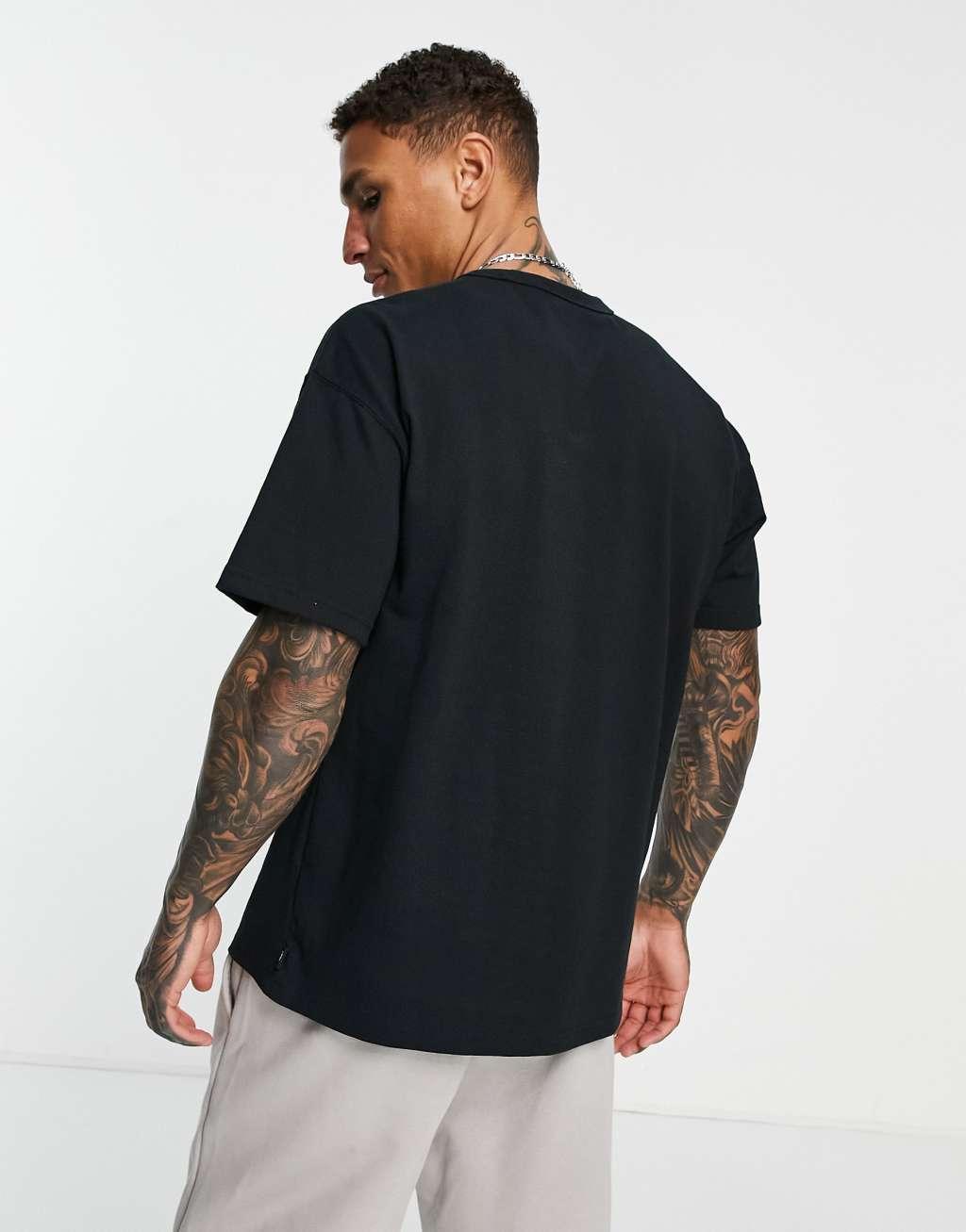 Nike Premium Essentials unisex oversized T-shirt in black Product Image