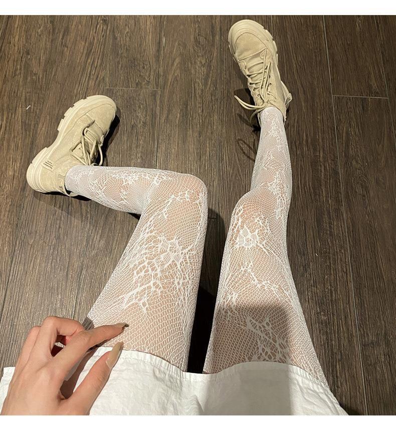 Bow Pattern Fishnet Tights Product Image