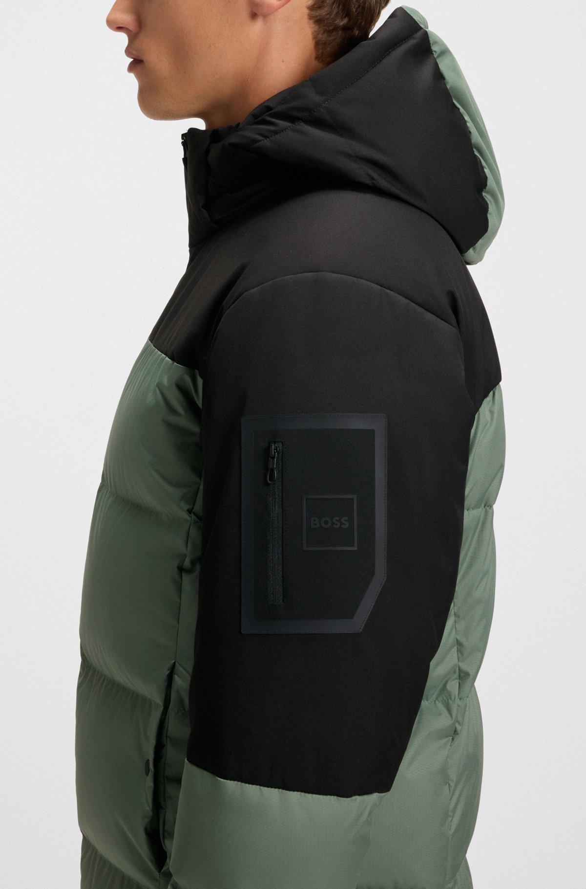 Water-repellent down jacket with detachable hood and sleeves Product Image