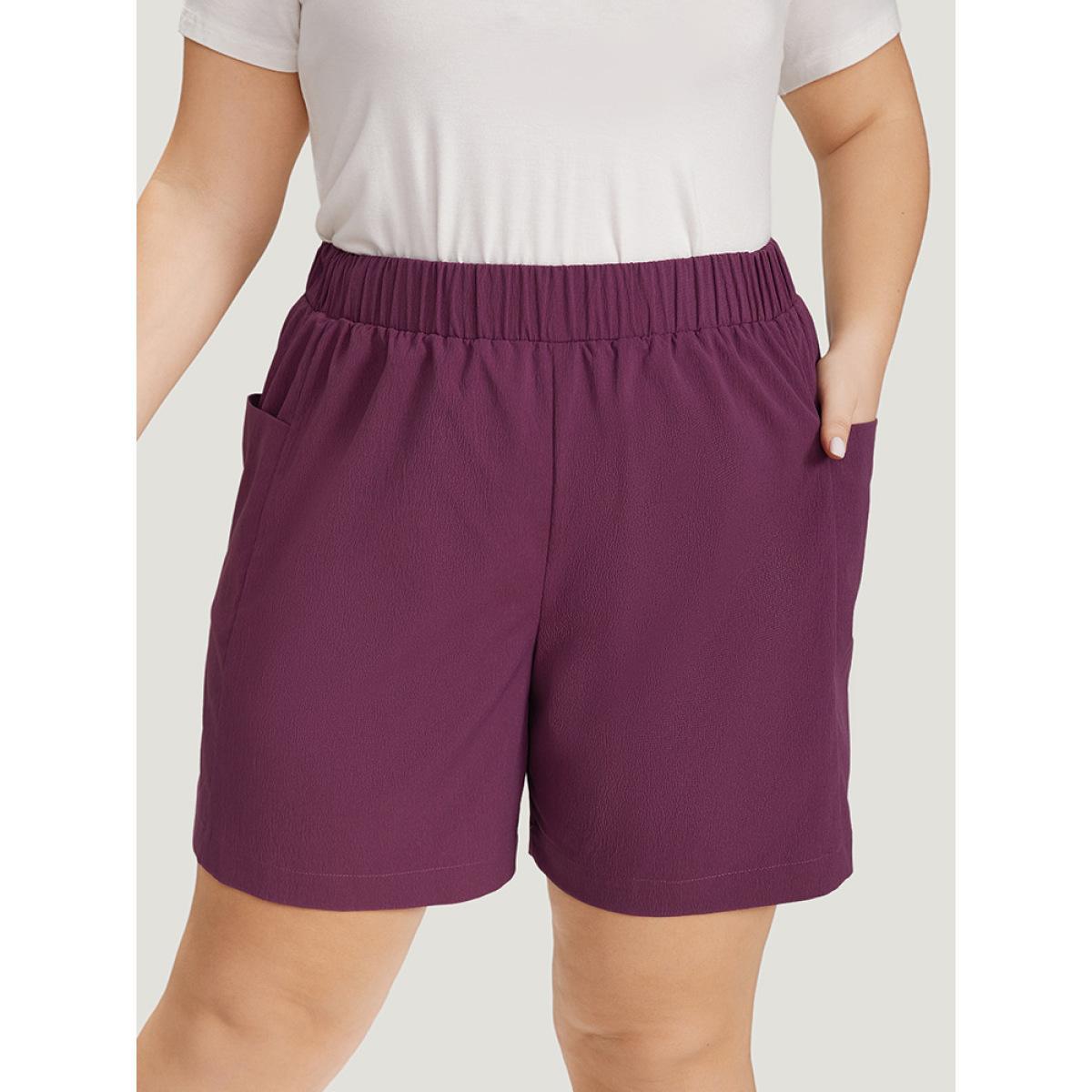 Plus Size Solid Patched Pocket Elastic Waist Shorts Women Purple Casual Elastic Waist Dailywear Shorts BloomChic 26/4X Product Image