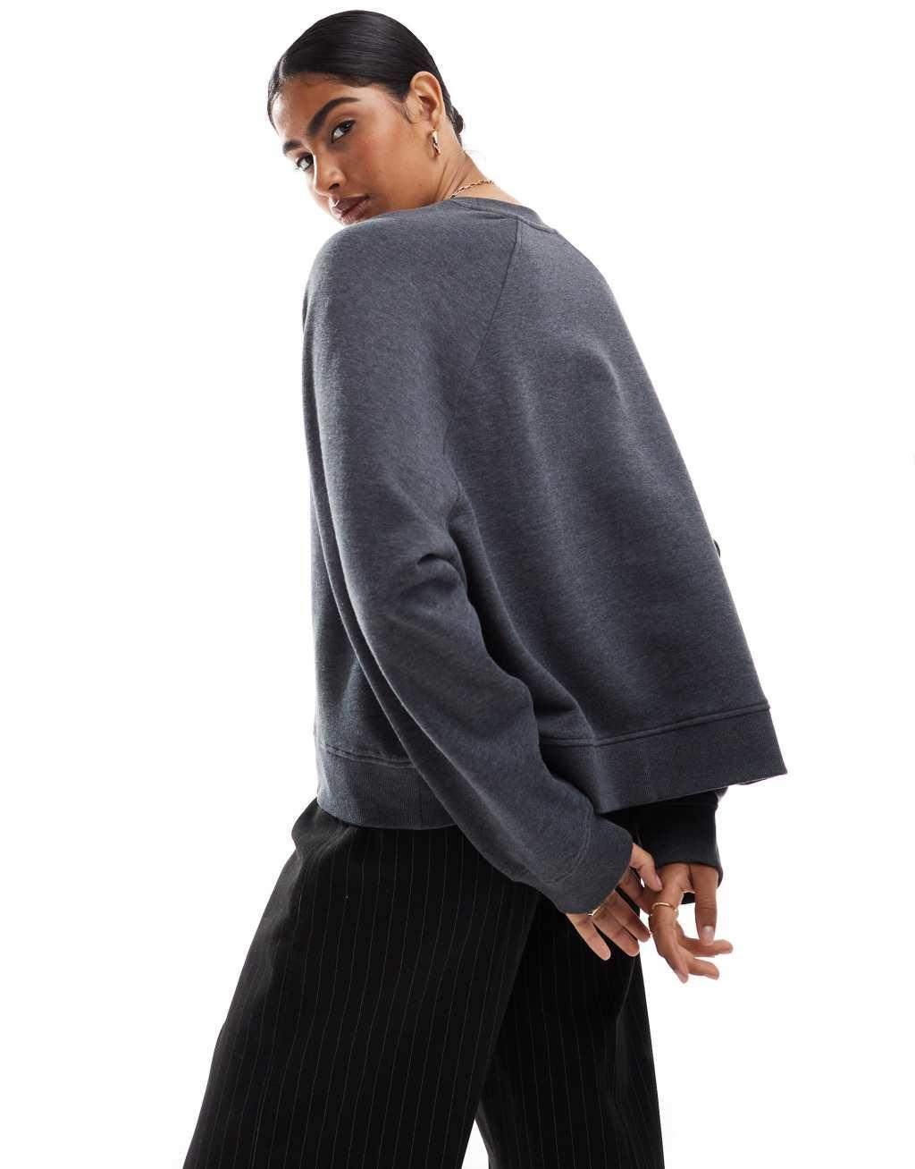 ASOS DESIGN oversized sweat with raglan detail in black Product Image