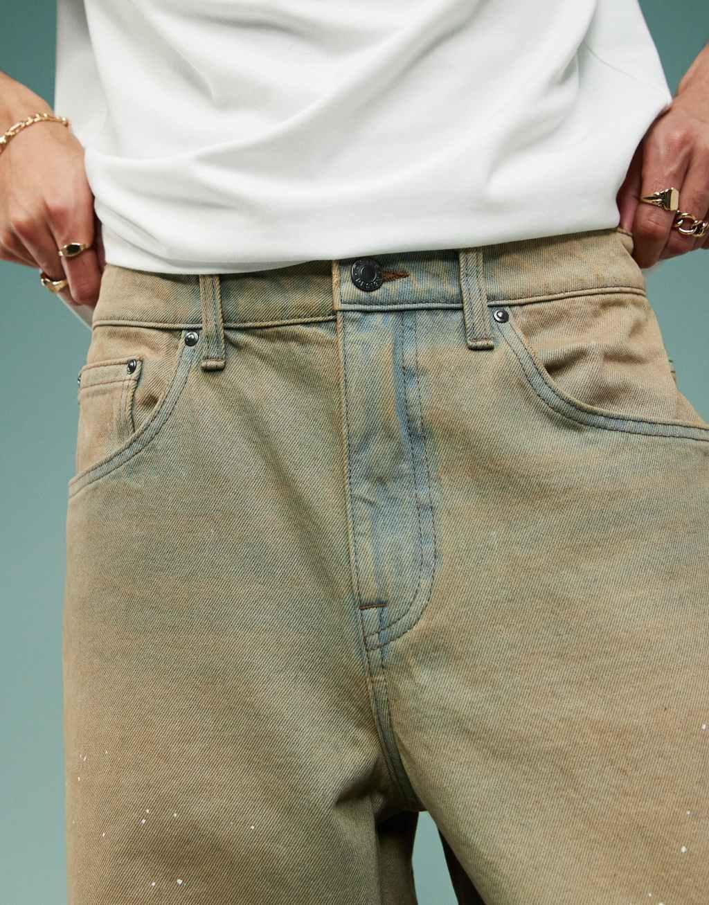 ASOS DESIGN baggy jeans with paint splatter in brown tint Product Image
